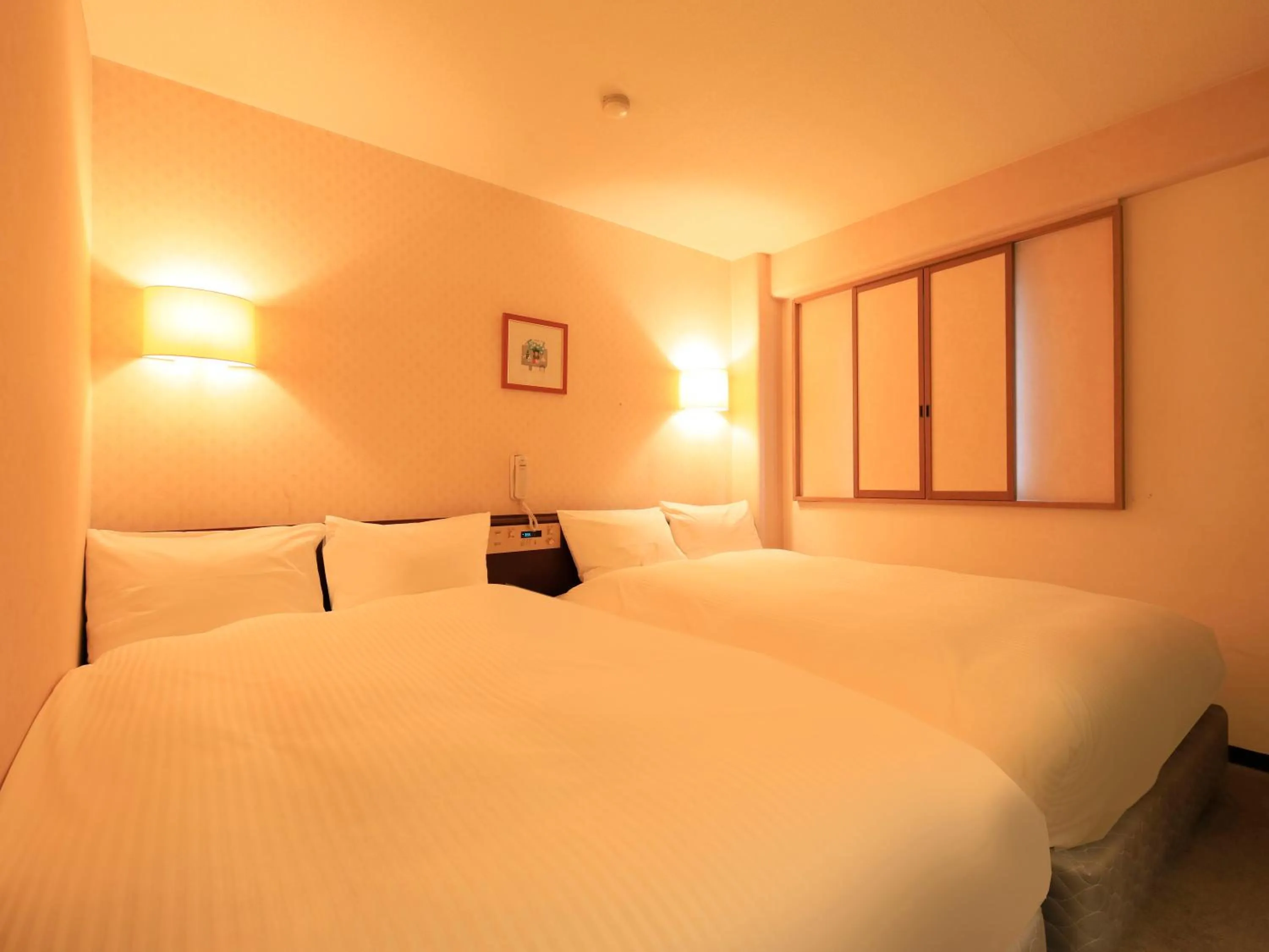 Photo of the whole room, Bed in Centurion Hotel Hamamatsu