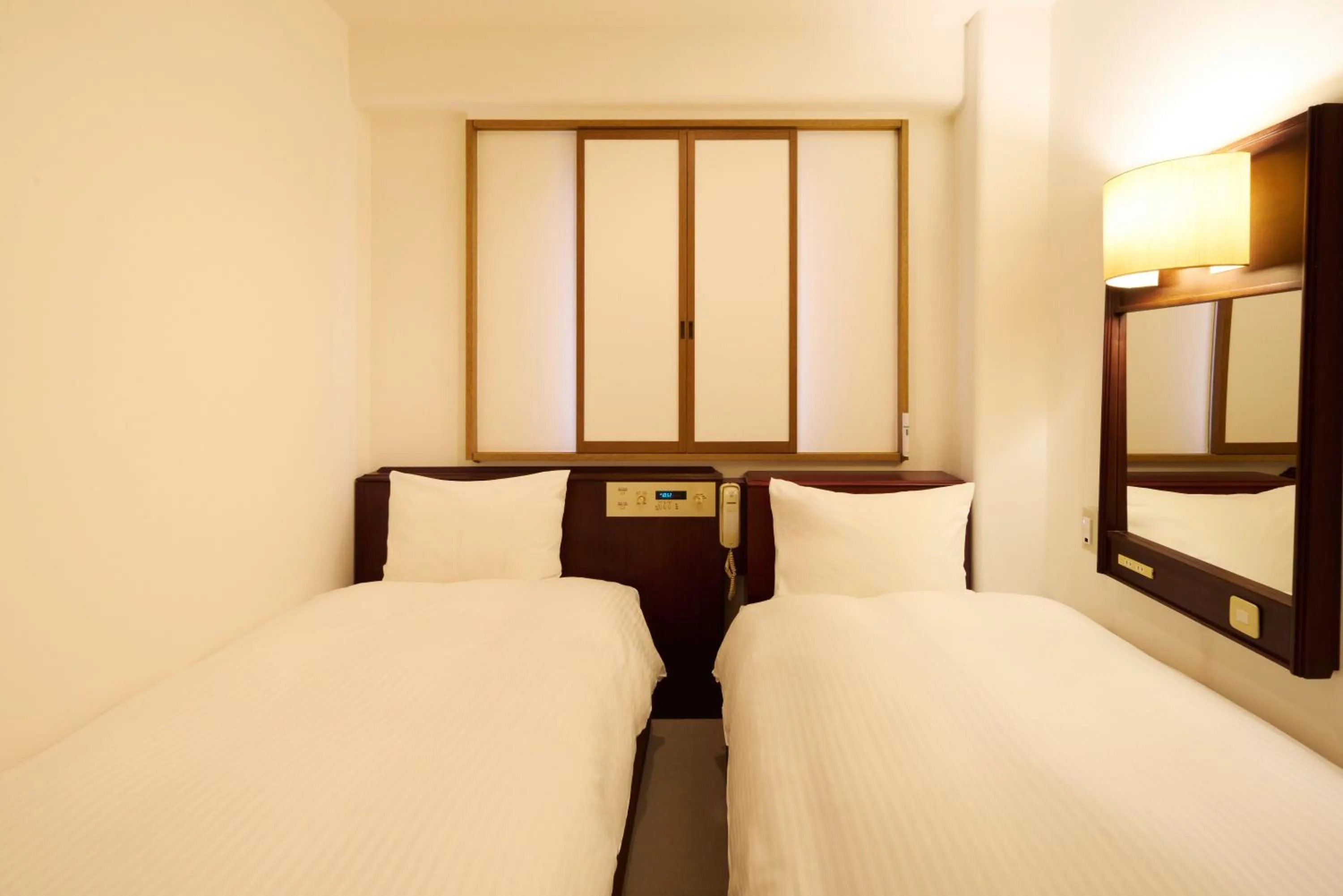 Photo of the whole room, Bed in Centurion Hotel Hamamatsu