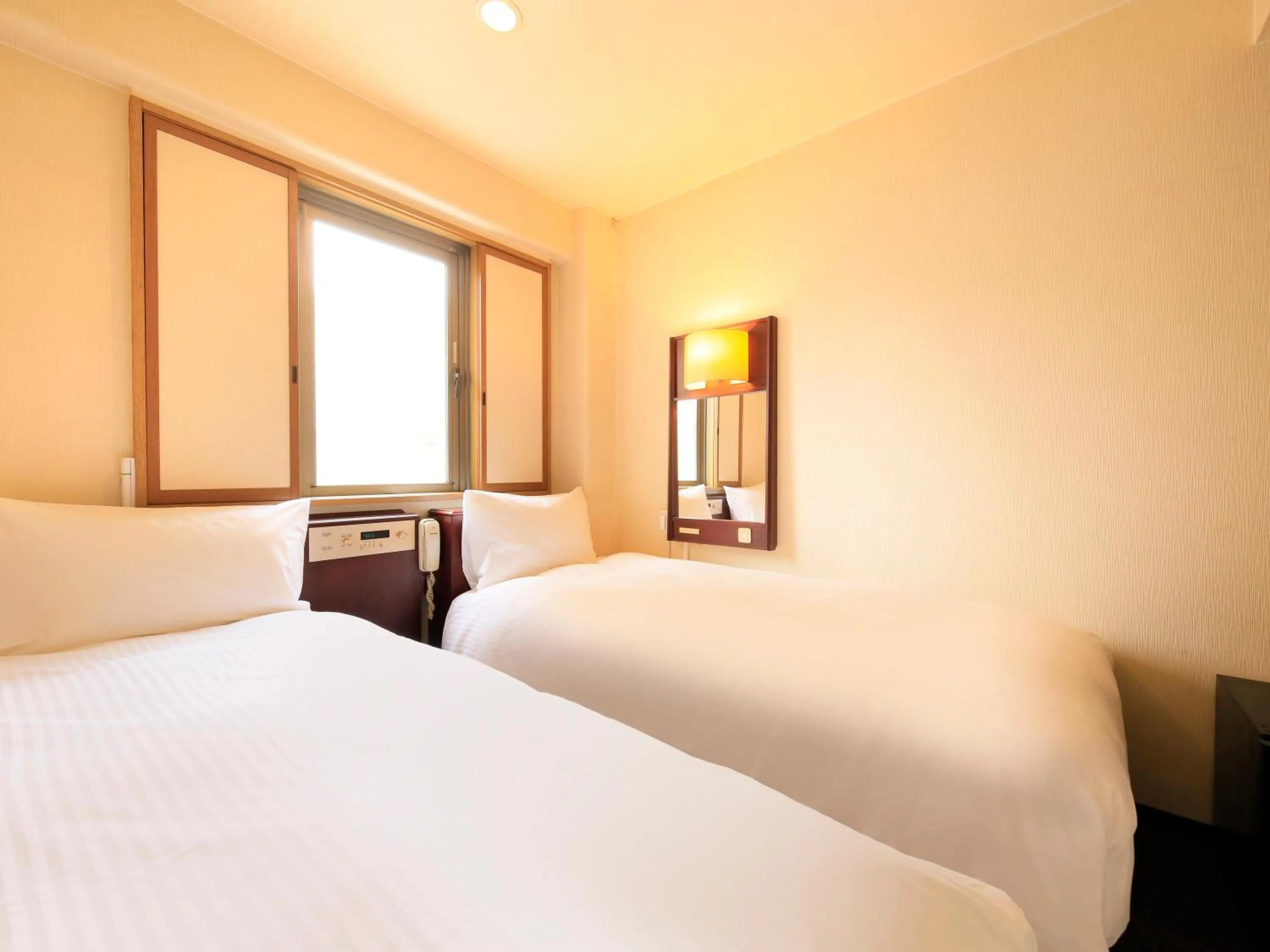 Photo of the whole room, Bed in Centurion Hotel Hamamatsu