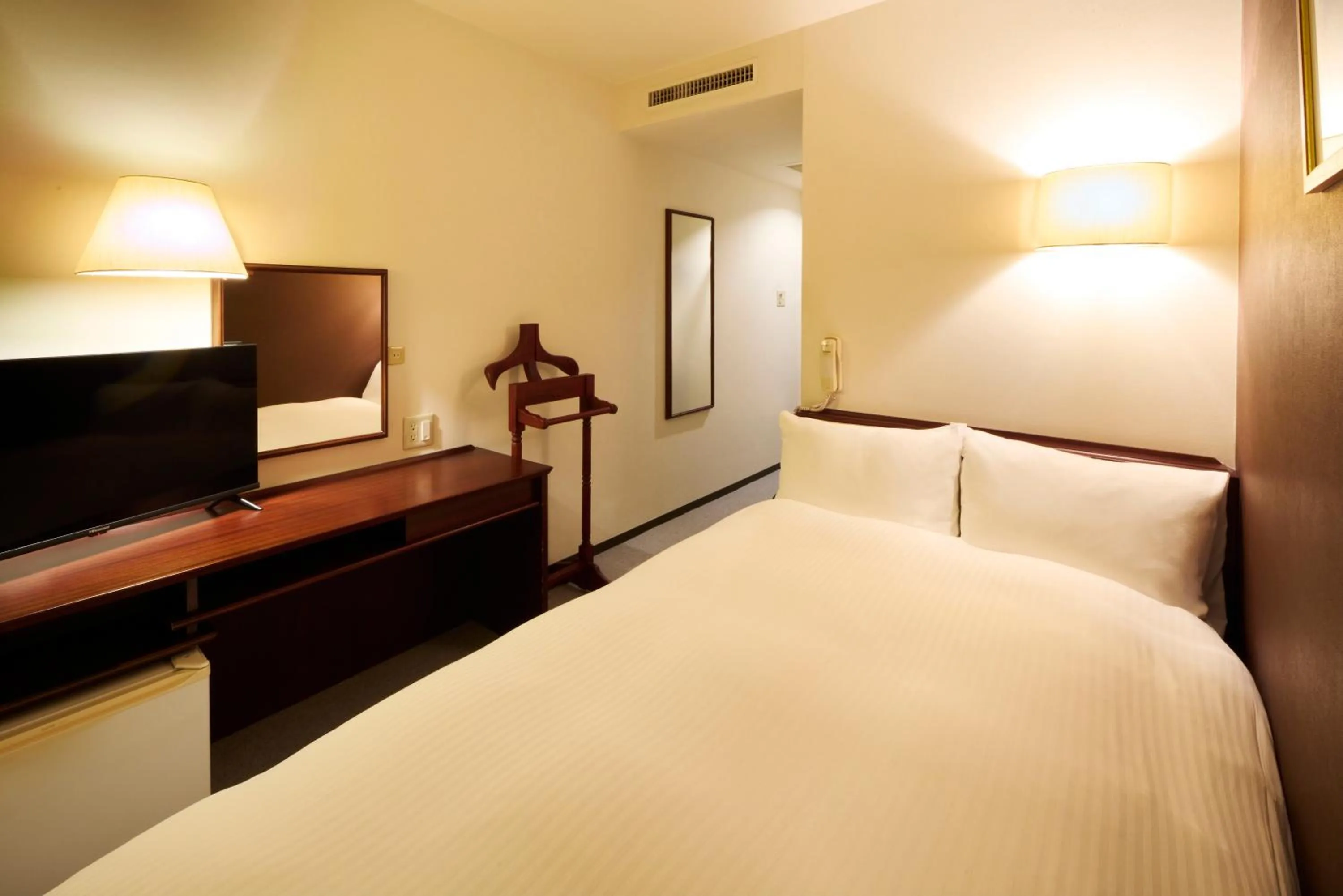 Photo of the whole room, Bed in Centurion Hotel Hamamatsu