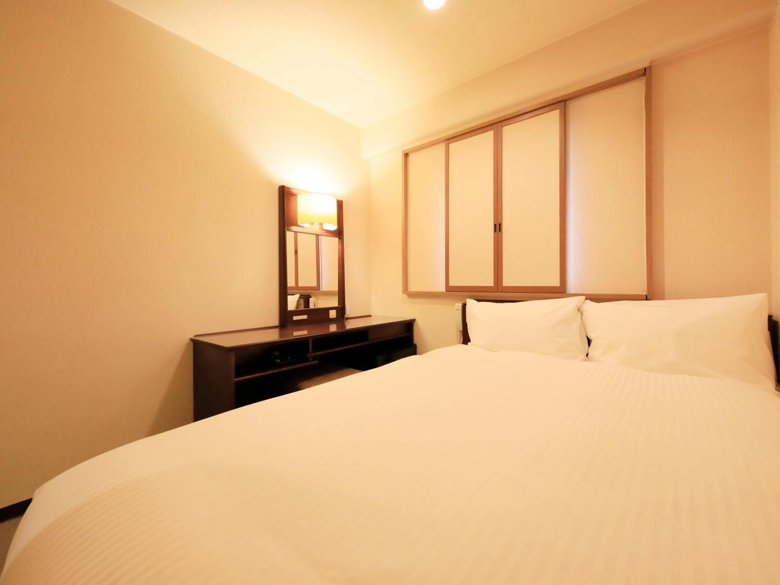 Photo of the whole room, Bed in Centurion Hotel Hamamatsu