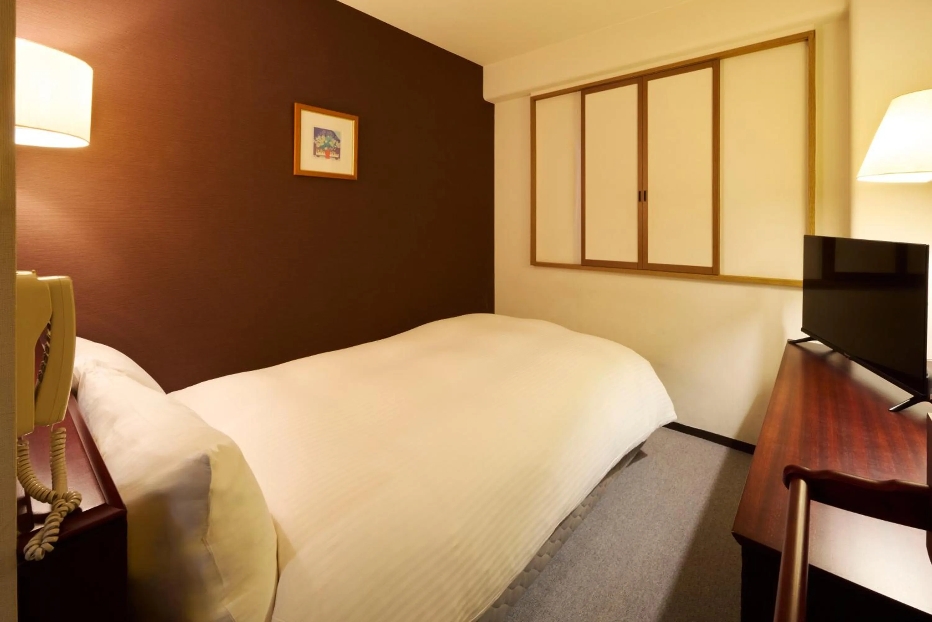 Photo of the whole room, Bed in Centurion Hotel Hamamatsu
