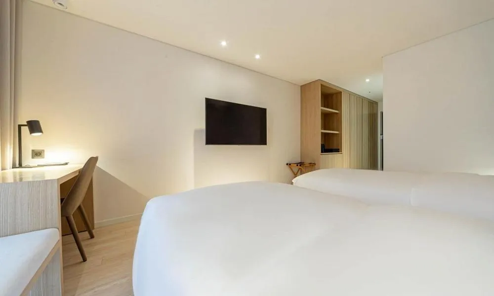 Photo of the whole room, Bed in Pohang Hotel Noblion