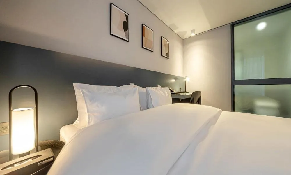 Photo of the whole room, Bed in Pohang Hotel Noblion