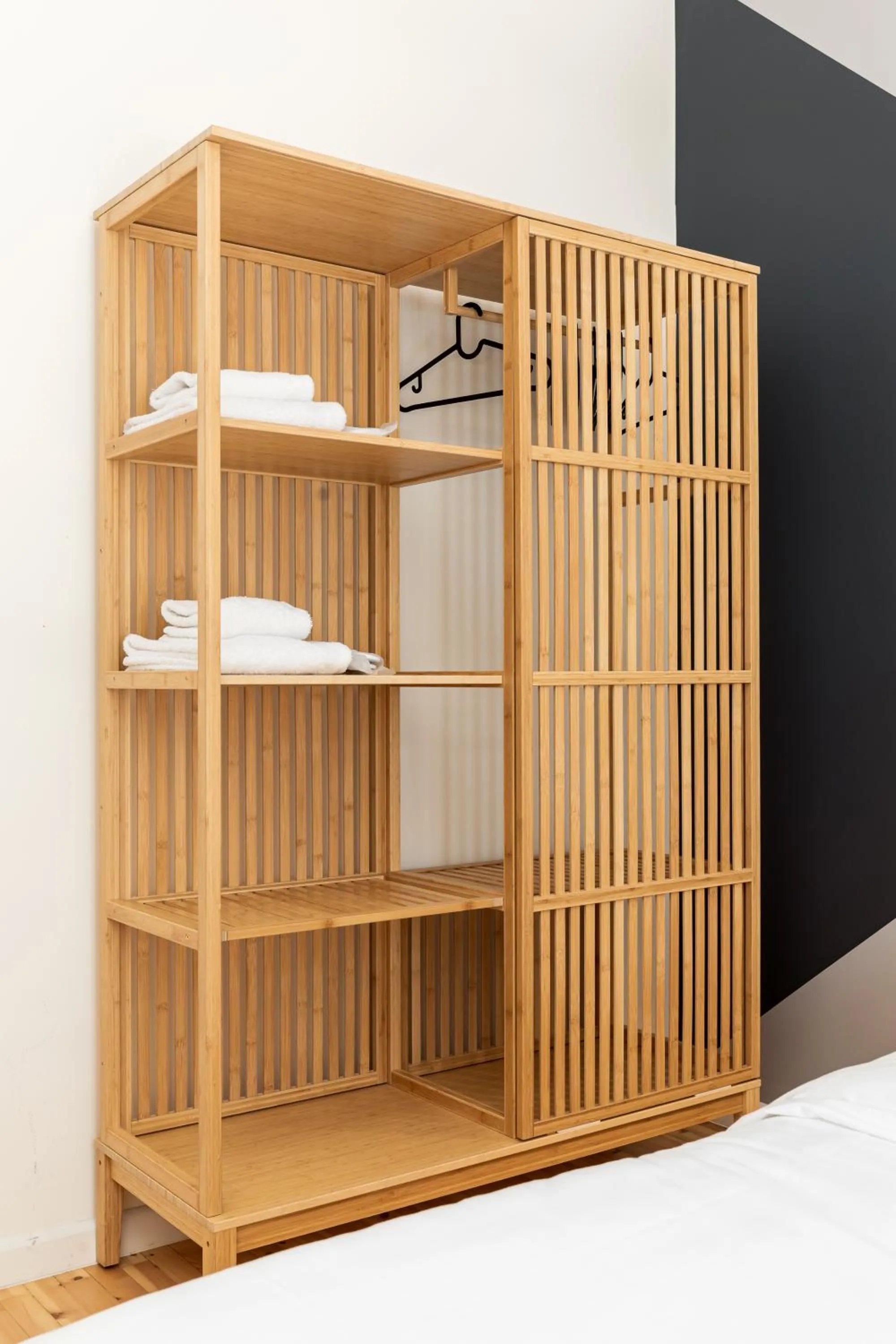 wardrobe in Vista by halu!: Spacious City Centre Home