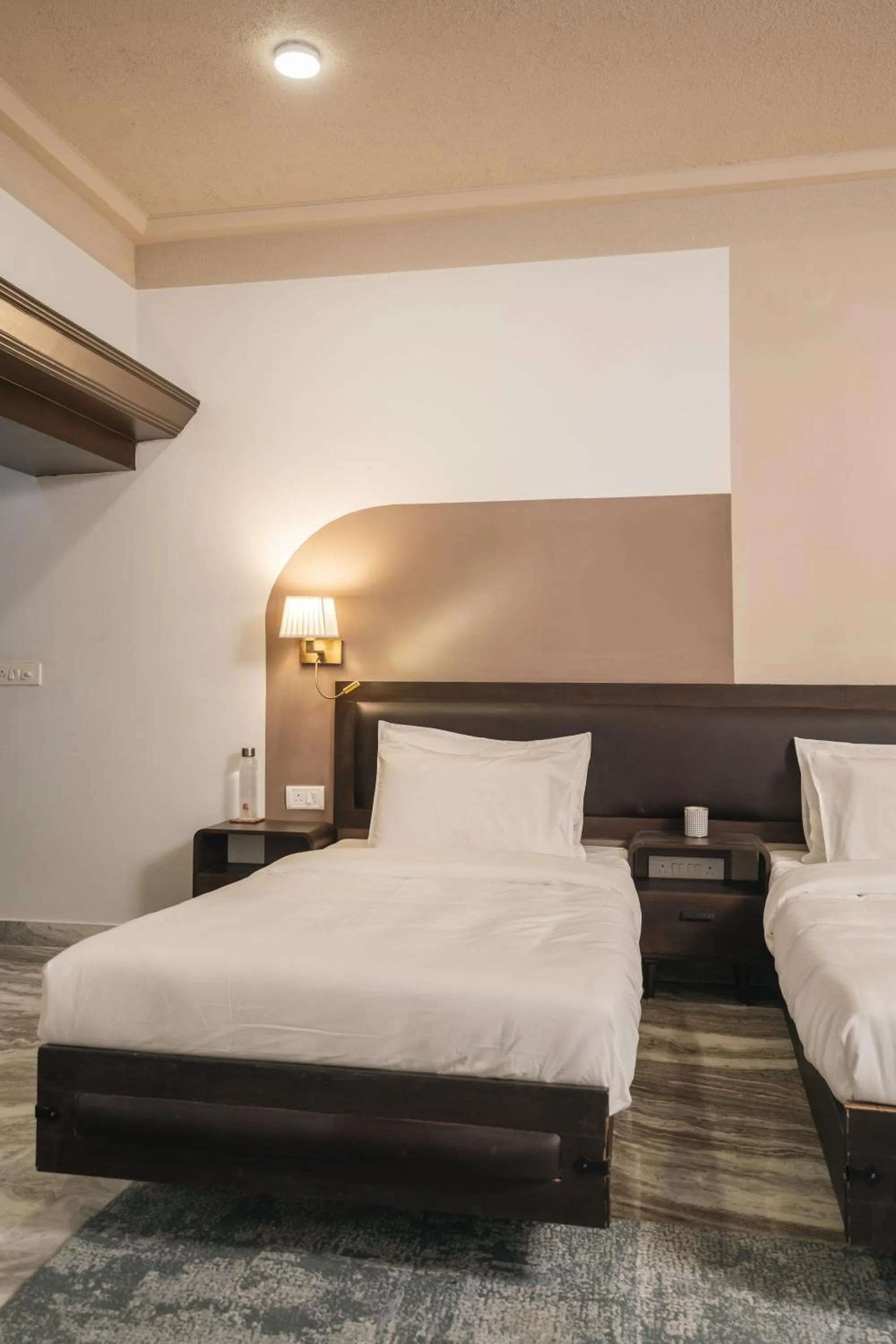 Bed in Firebrick Boutique Residences - GARNET HOUSE