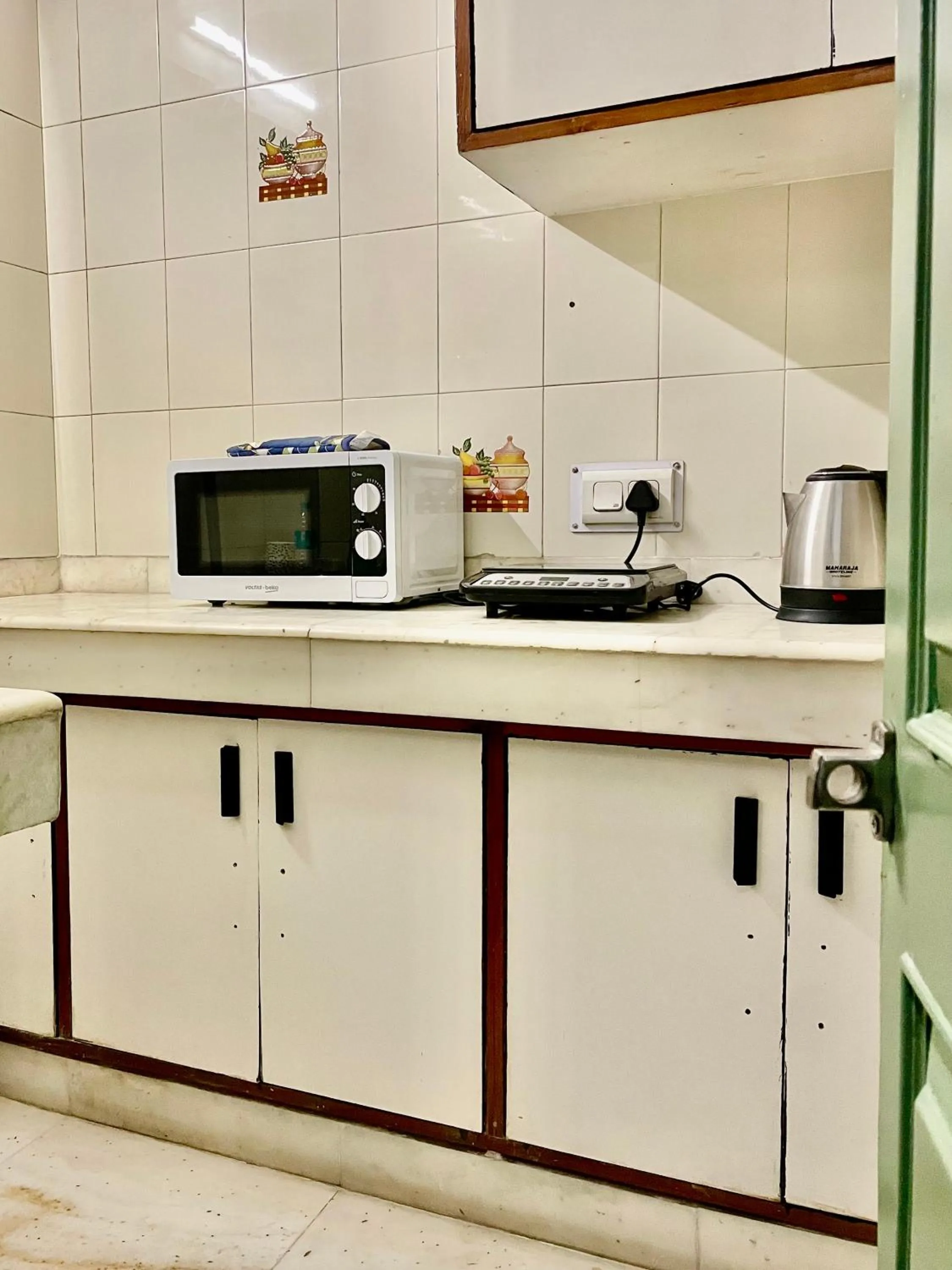 Kitchen or kitchenette in Firebrick Boutique Residences - GARNET HOUSE