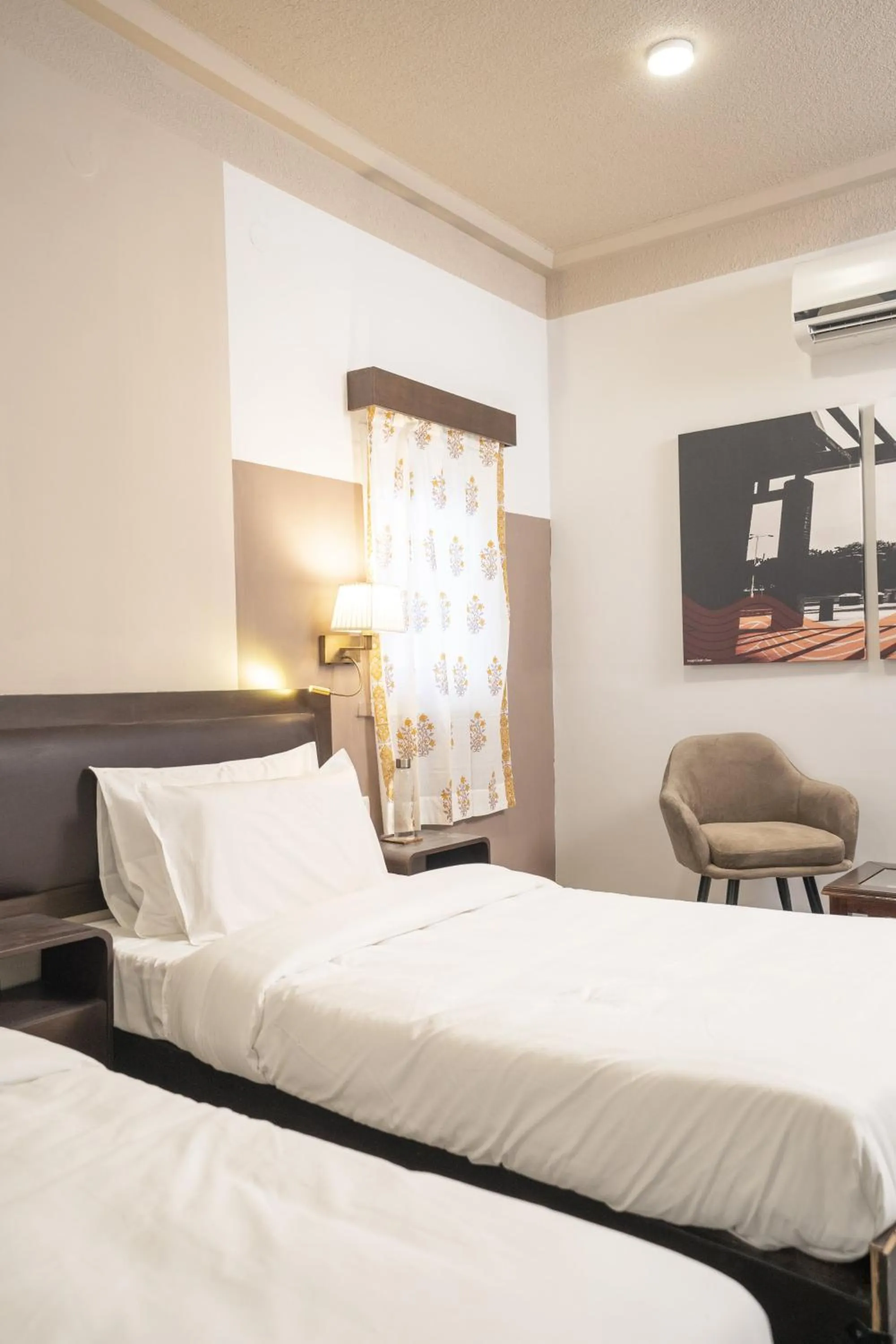 Seating area, Bed in Firebrick Boutique Residences - GARNET HOUSE