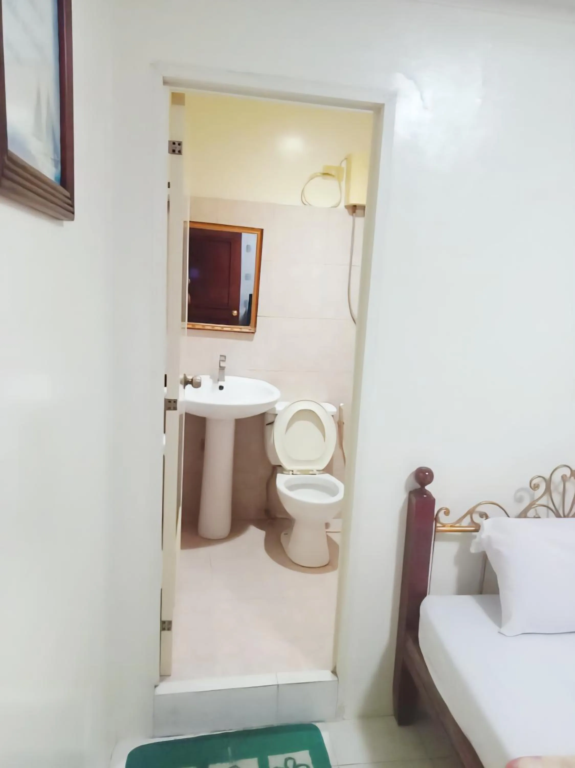 Bathroom, Bed in Goland Pension House & Dormitory by SMS Hospitality