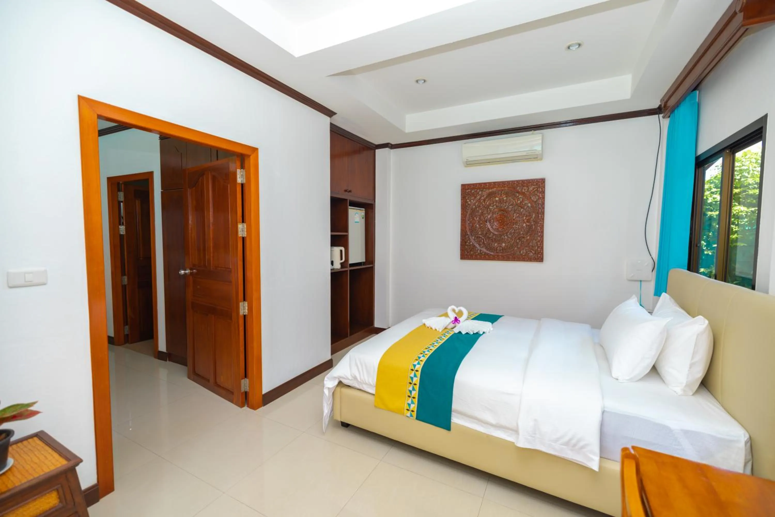 Bed in Kana Hotel Phuket普吉岛卡娜酒店