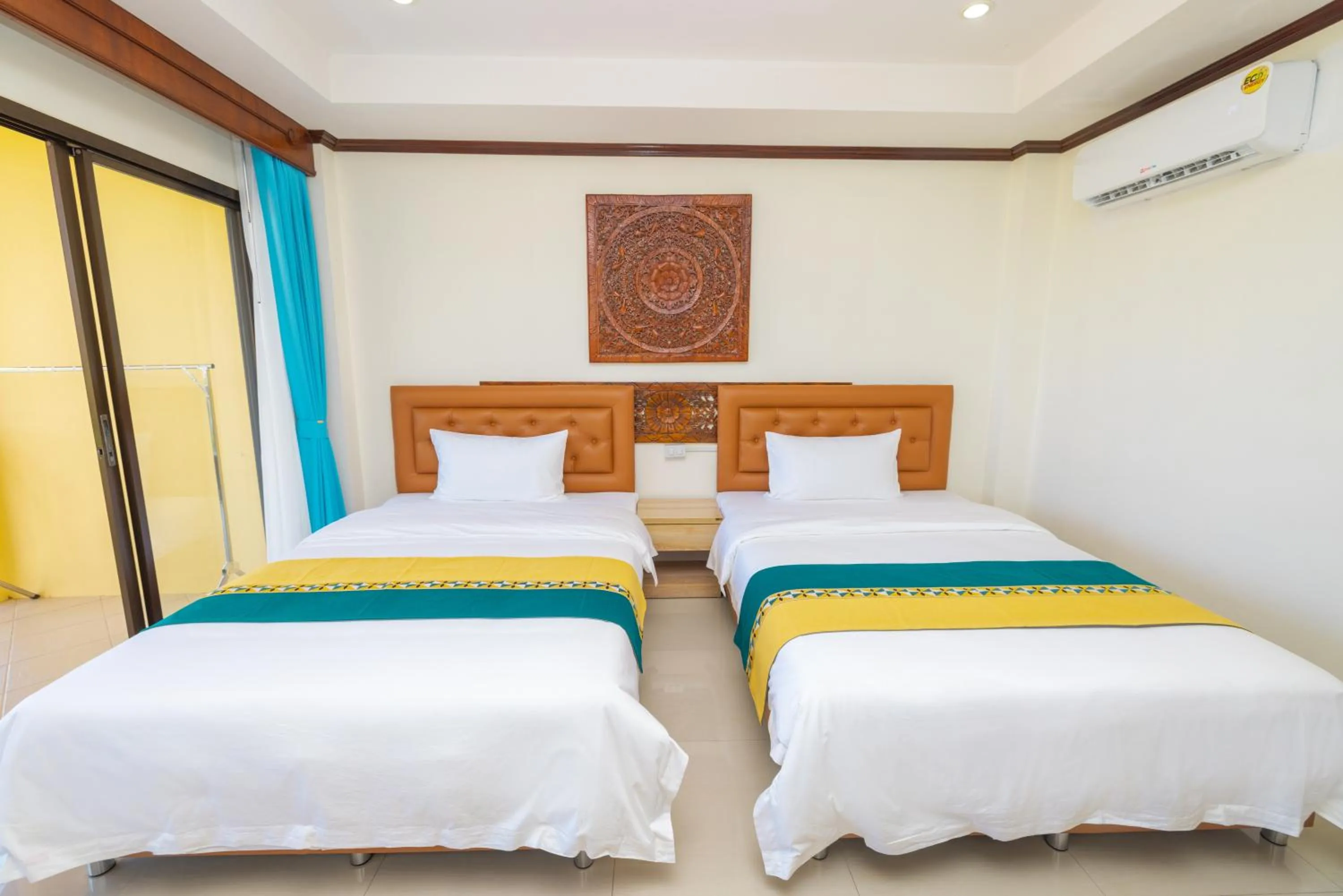 Bed in Kana Hotel Phuket普吉岛卡娜酒店