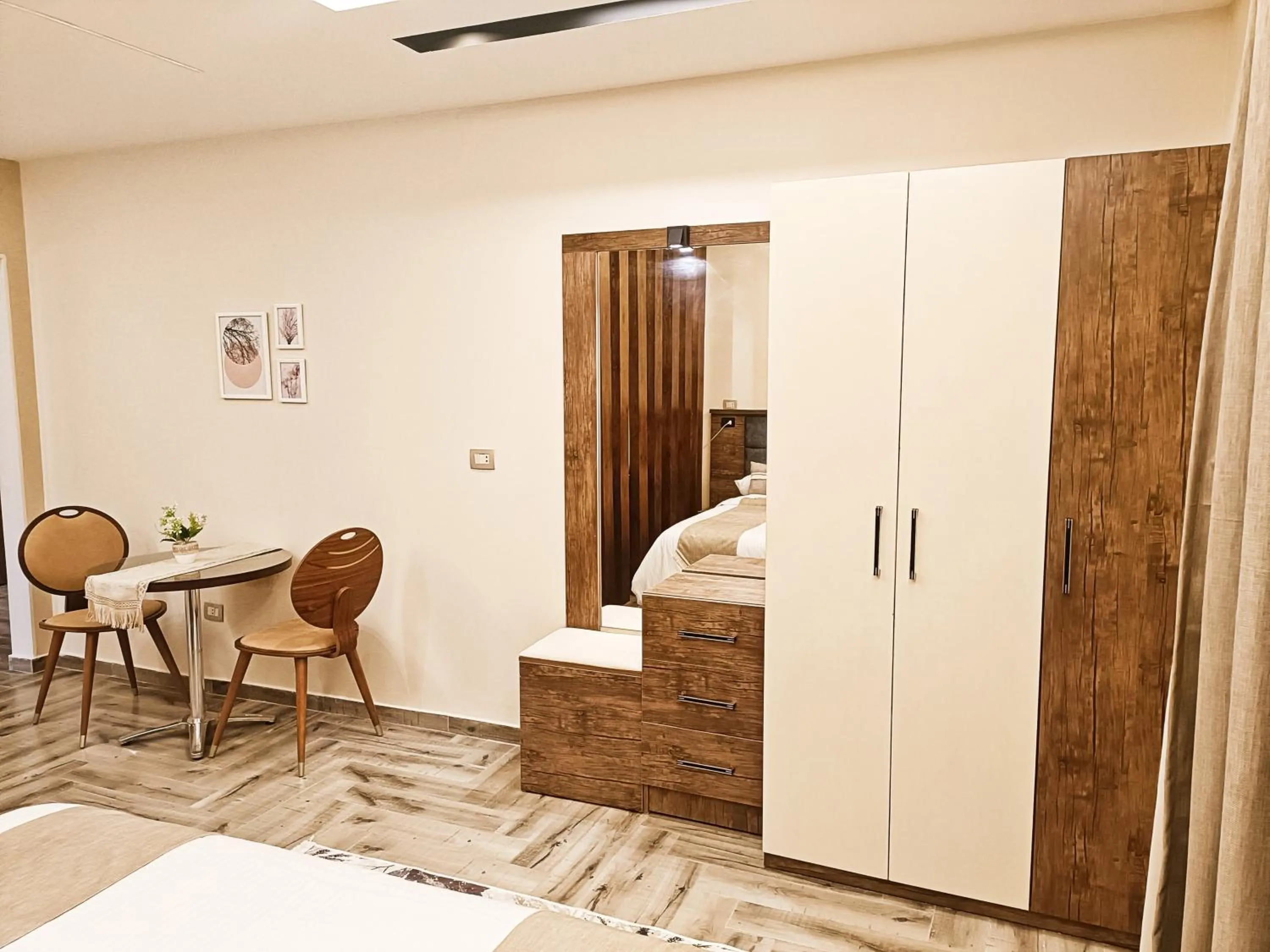 Seating area, Bed in My Villa