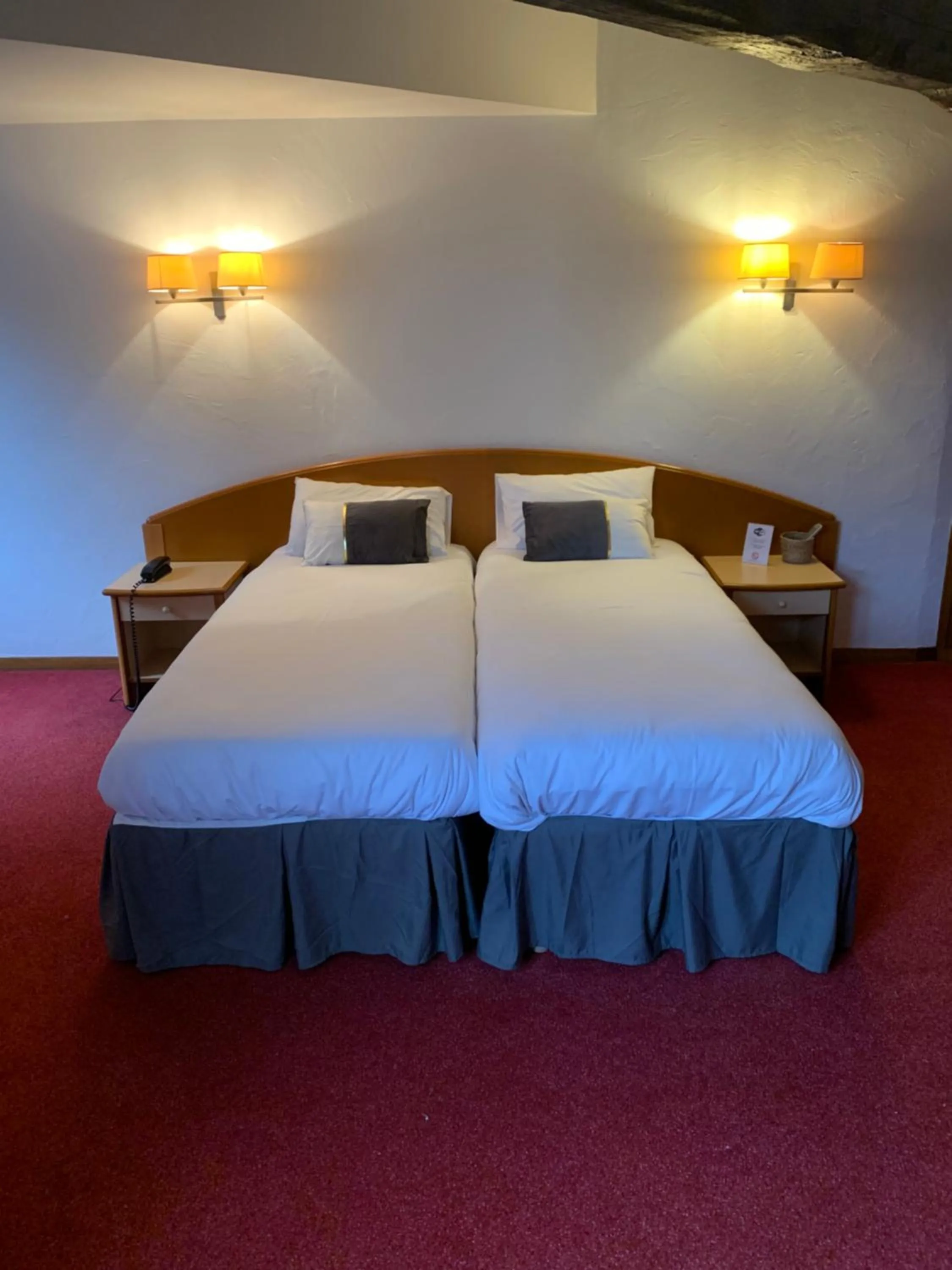 Bed in AUBERGE DU JEU D'ARC