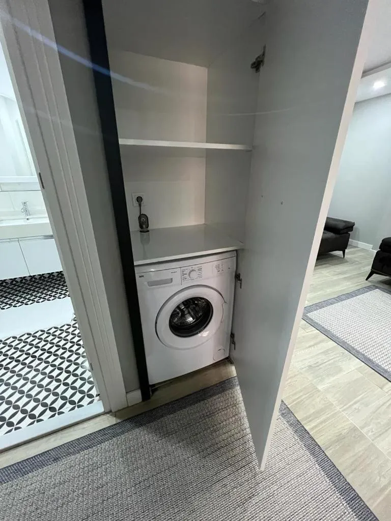 washing machine in Cosy Suite