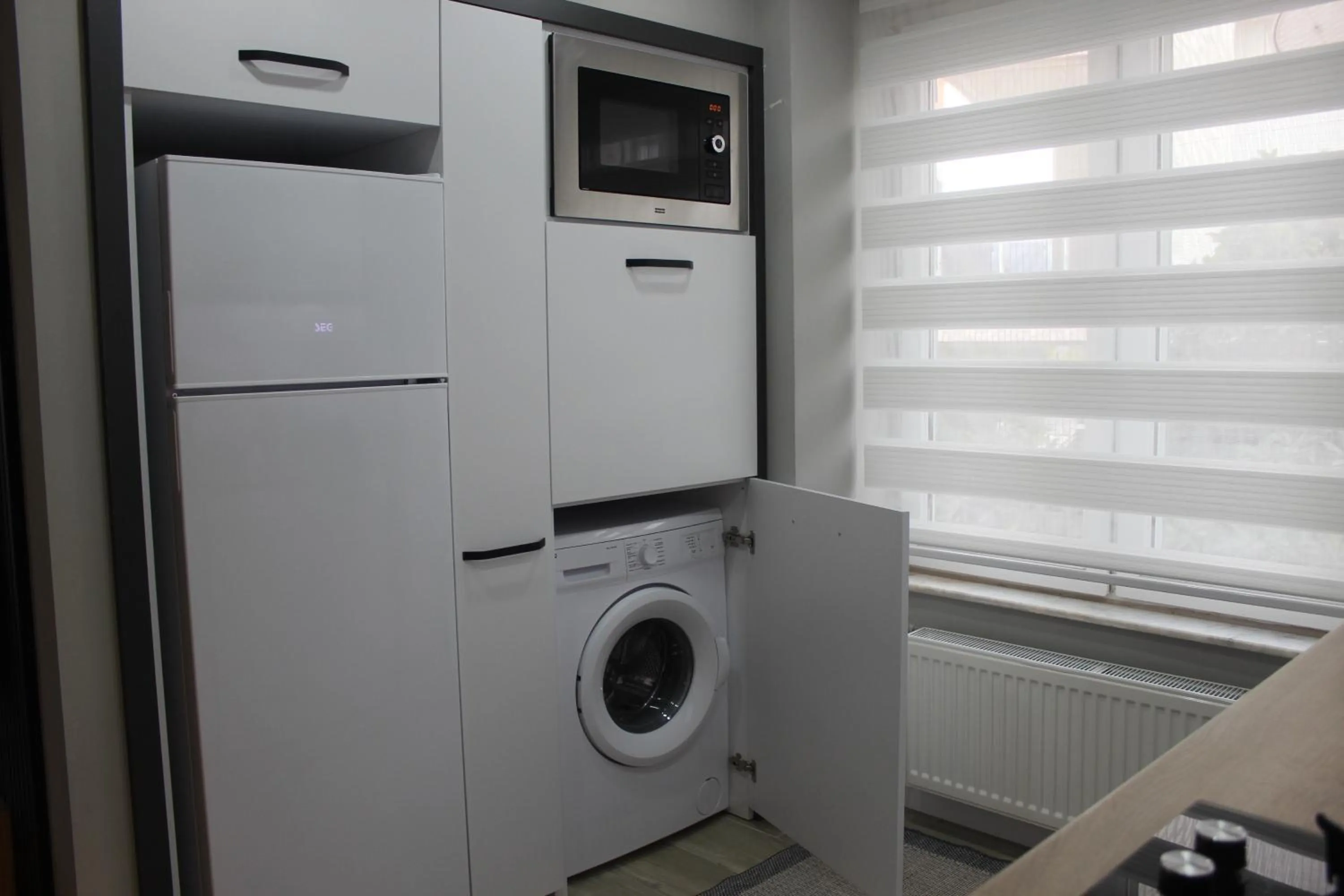 washing machine in Cosy Suite