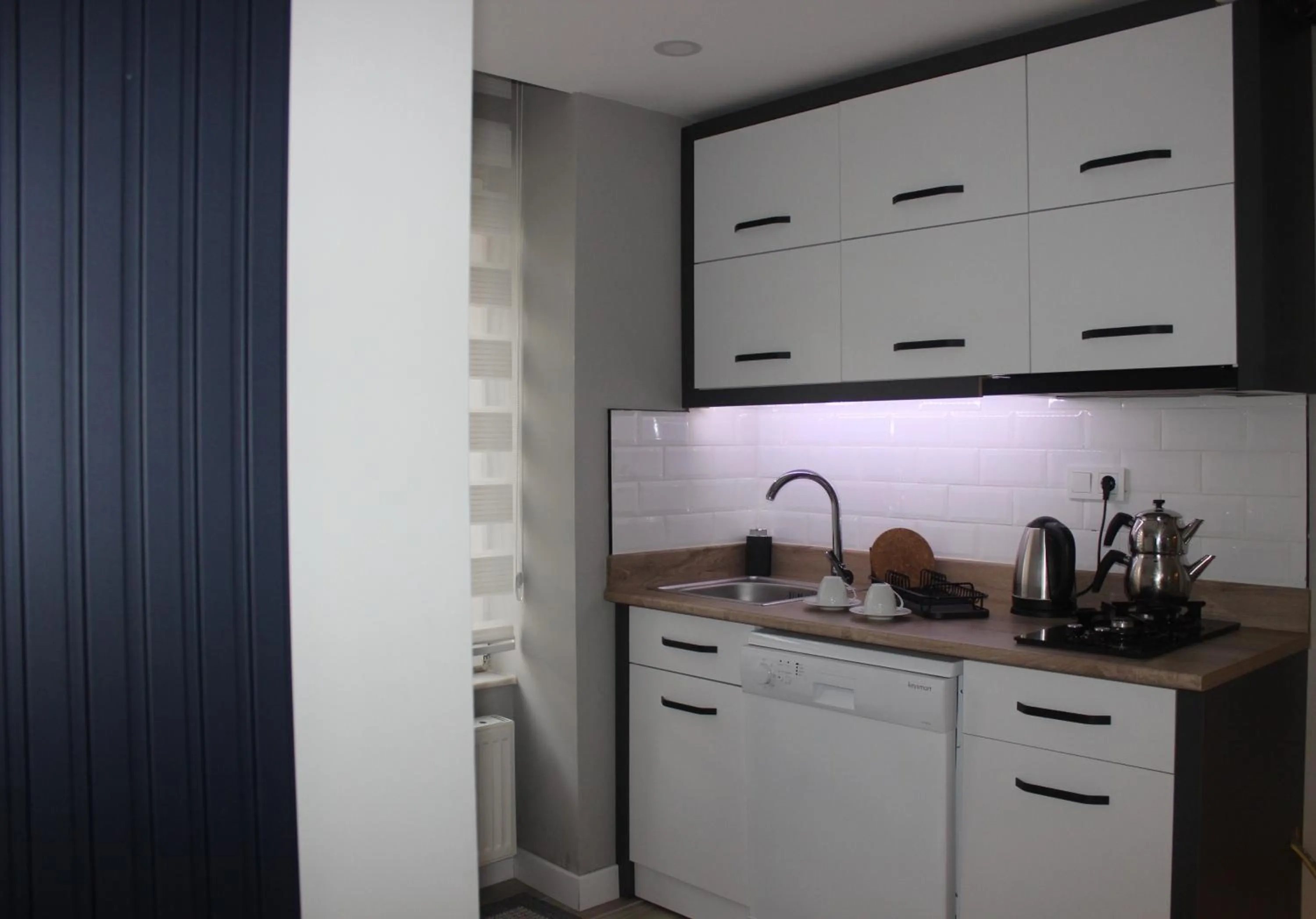 Kitchen or kitchenette in Cosy Suite