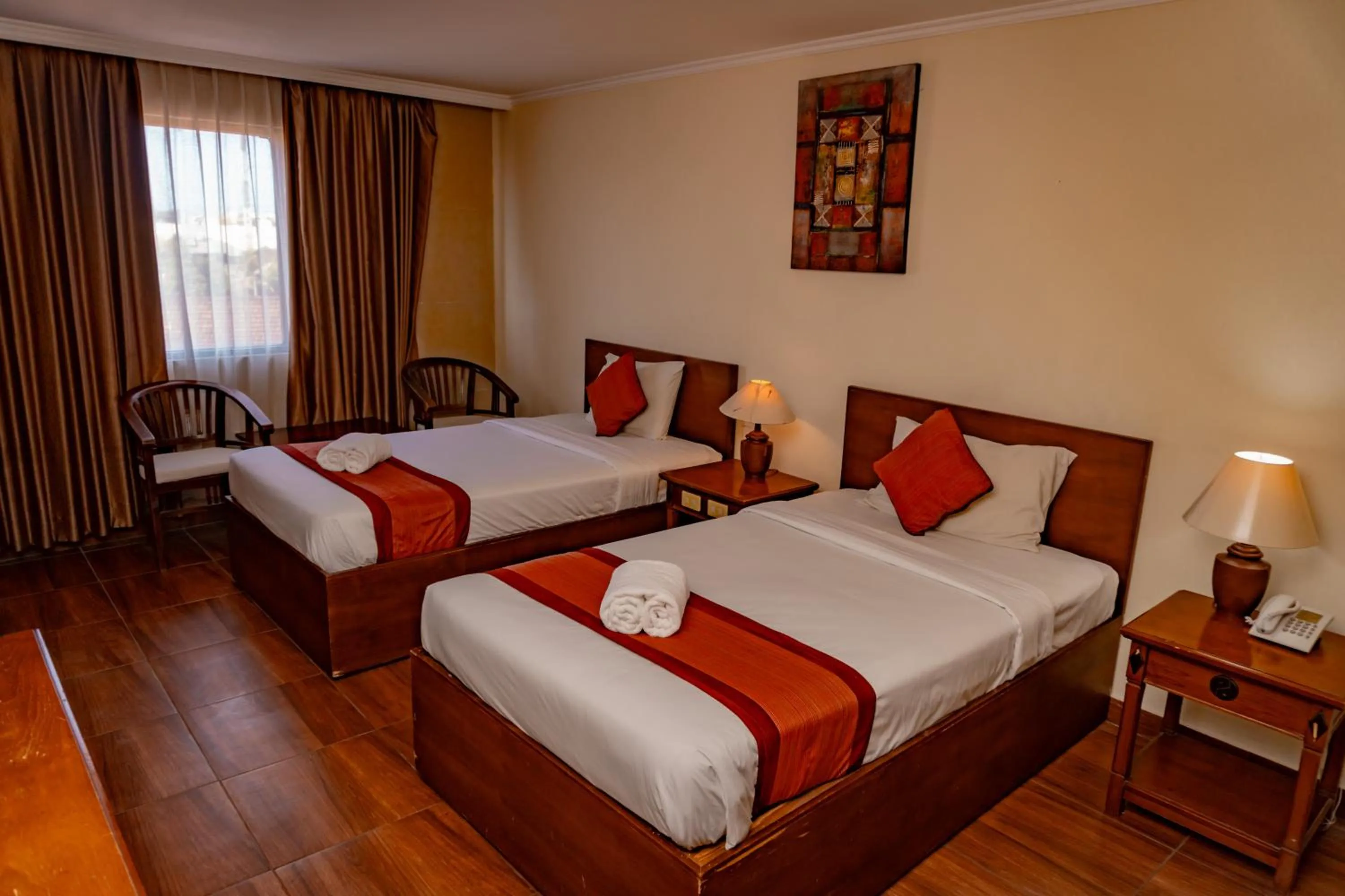 Bed in Hotel Puri Dibia Kuta