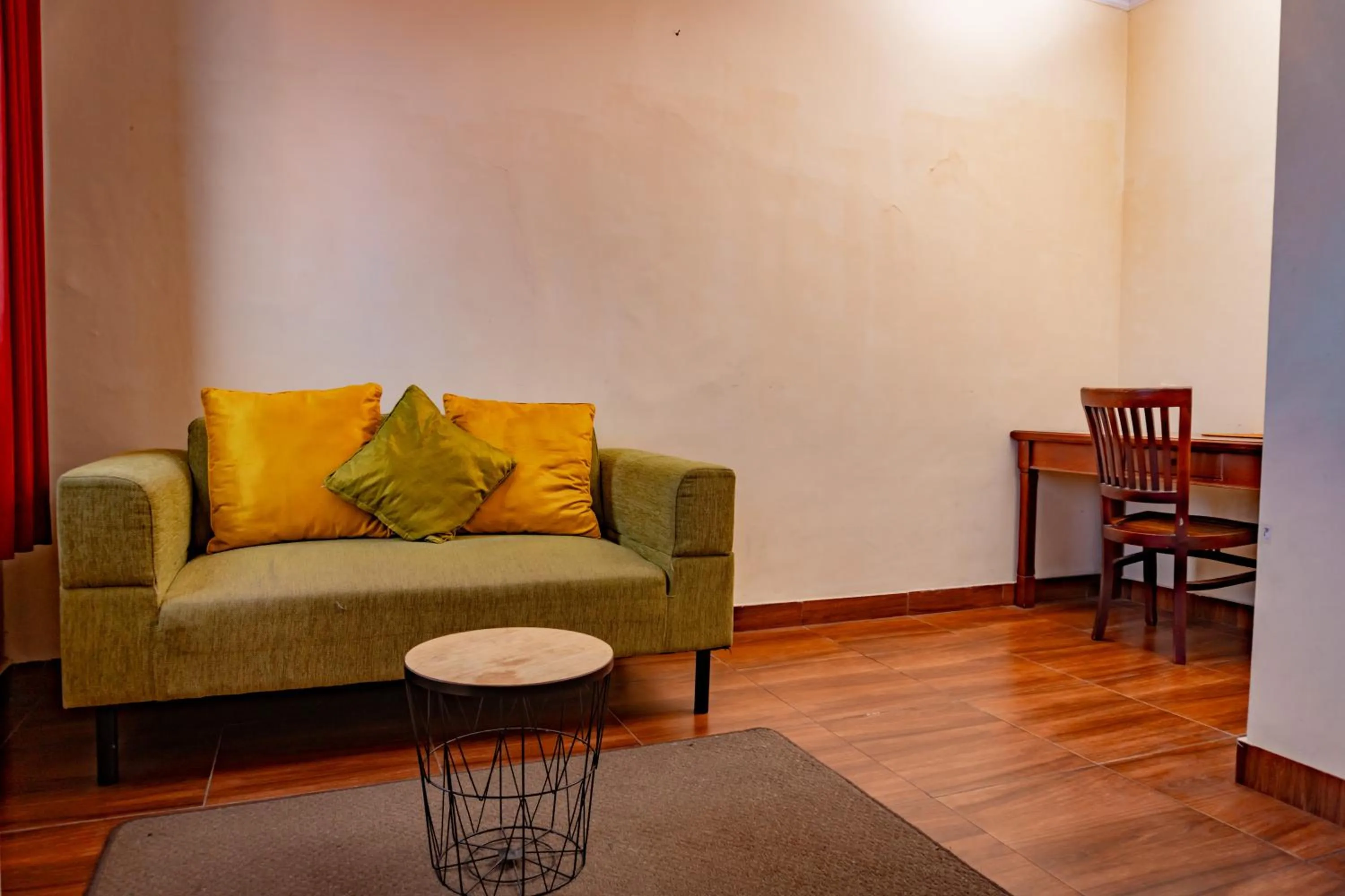 Seating area in Hotel Puri Dibia Kuta