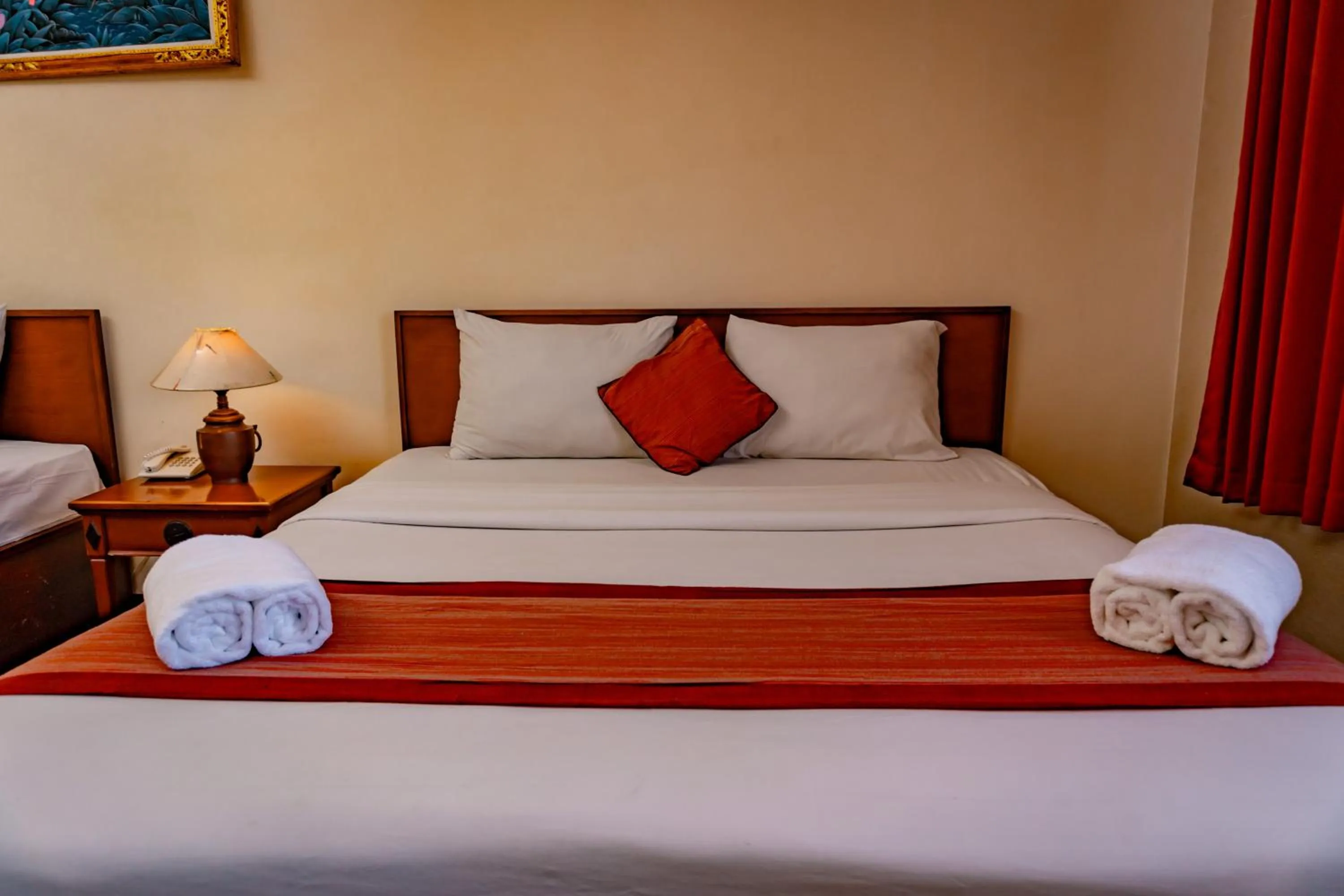 Bed in Hotel Puri Dibia Kuta