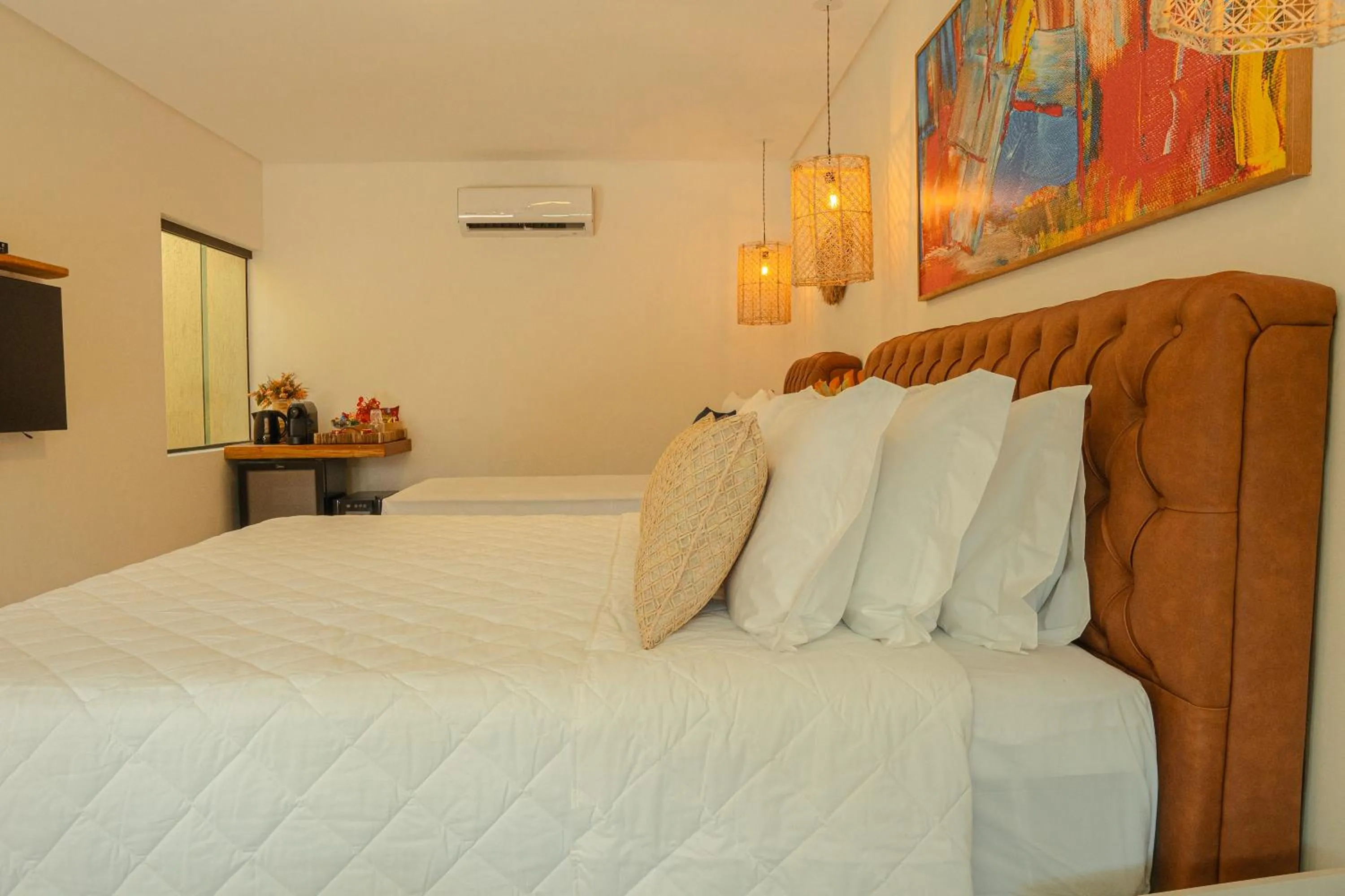 Bed in Pousada Mansão da Costa