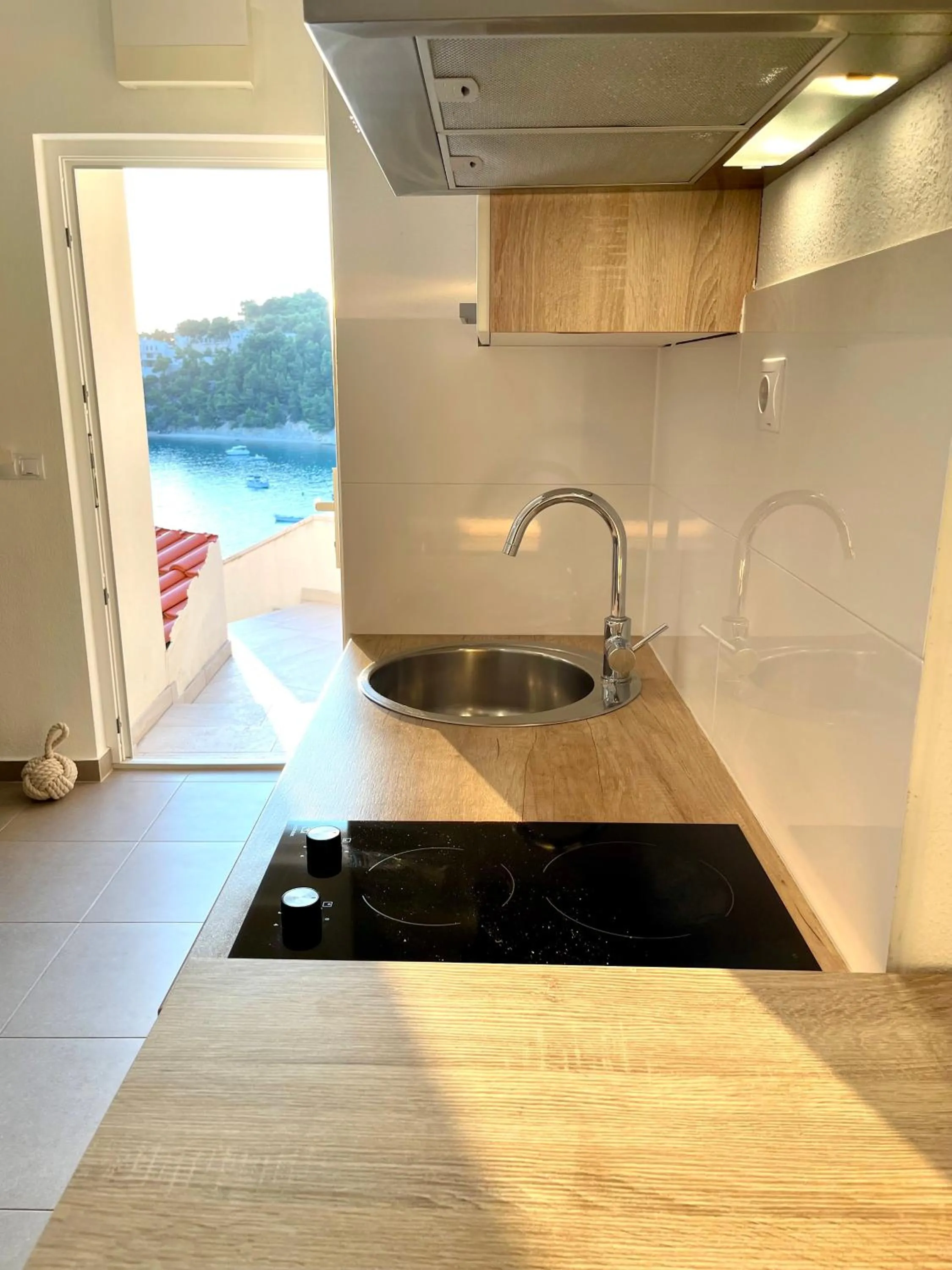 Kitchen or kitchenette in Apartments Domani