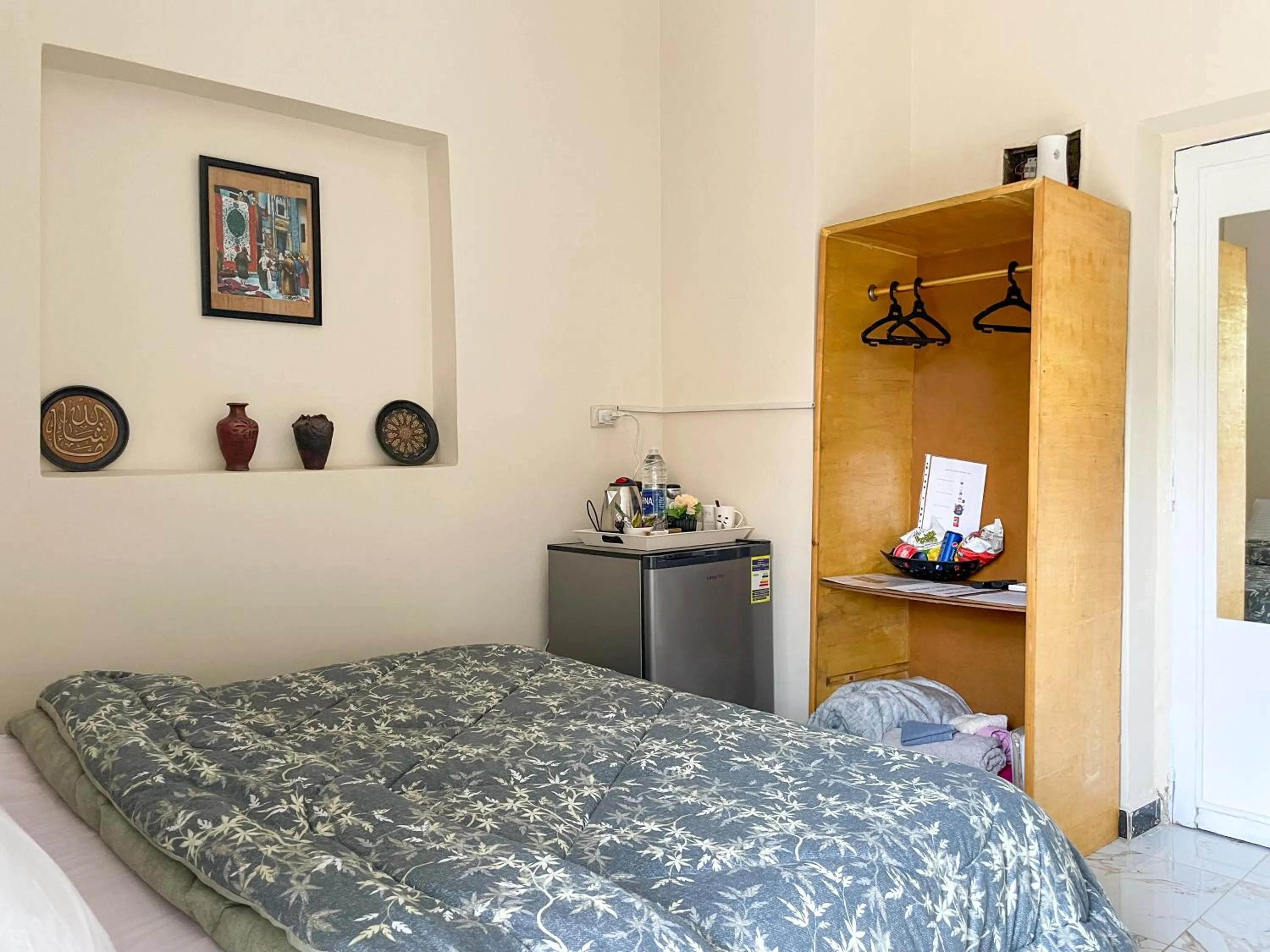 Bed in Chez l'ami hotel