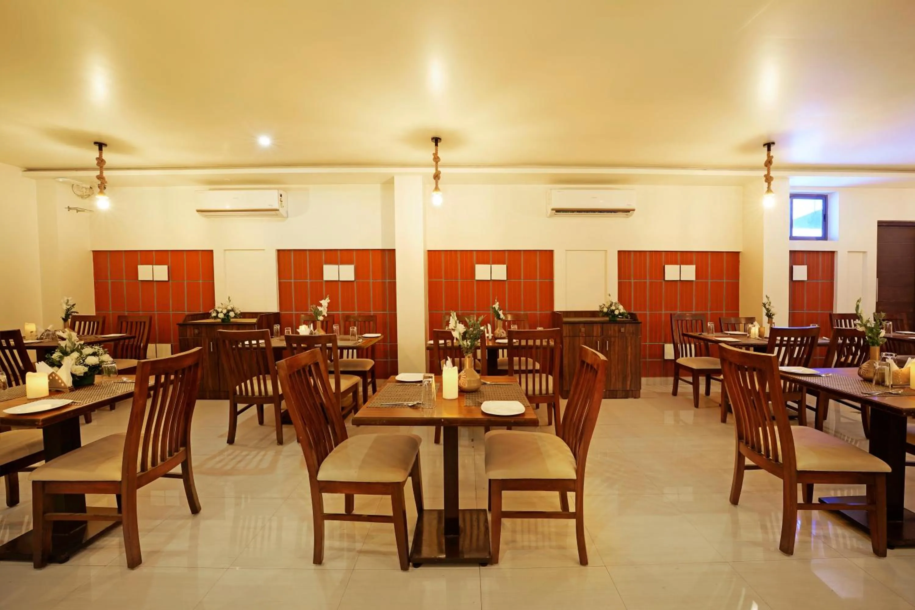 Dining area in Clover - A Rivido Hotel Jigani