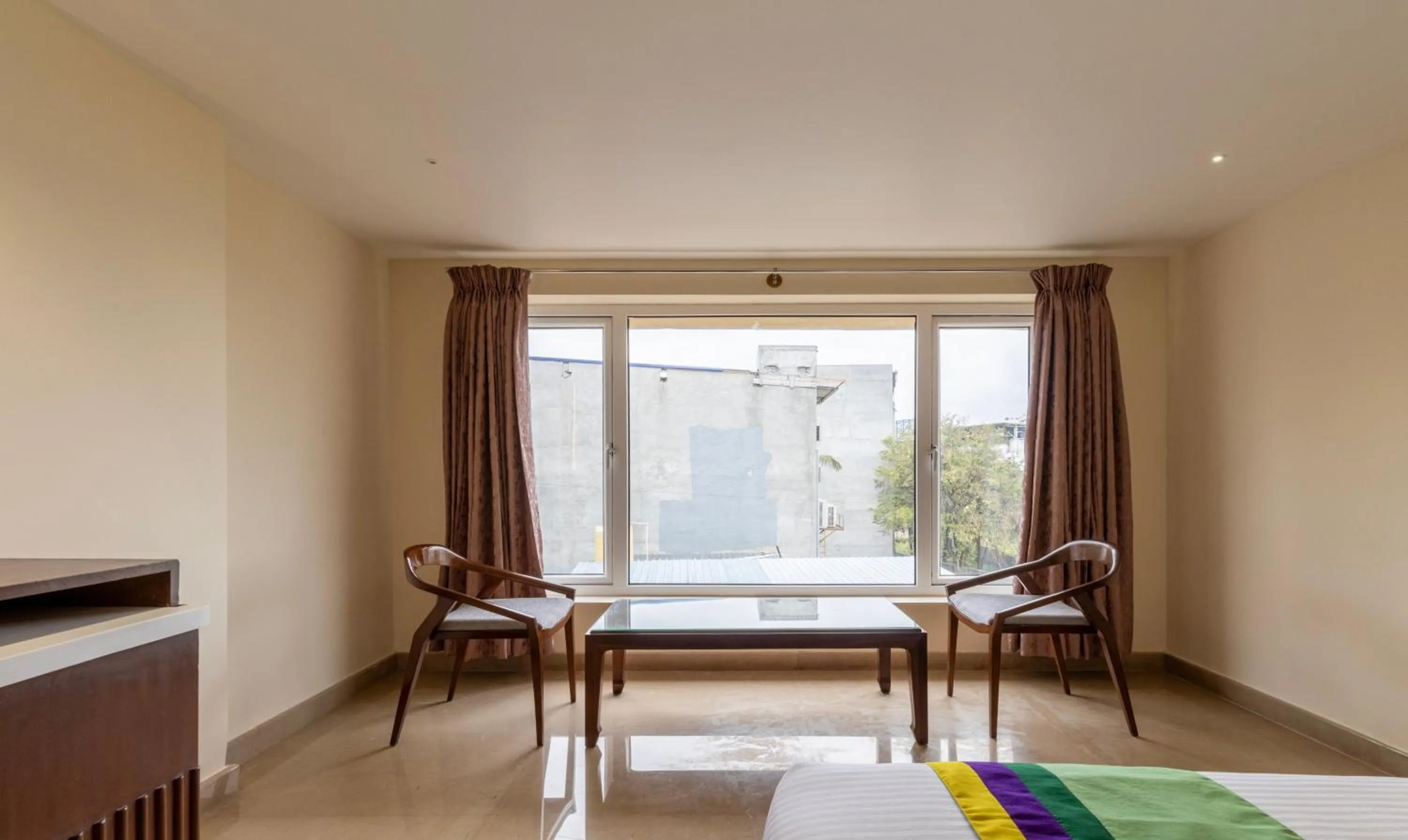 Seating area in Treebo Suvarna Comforts