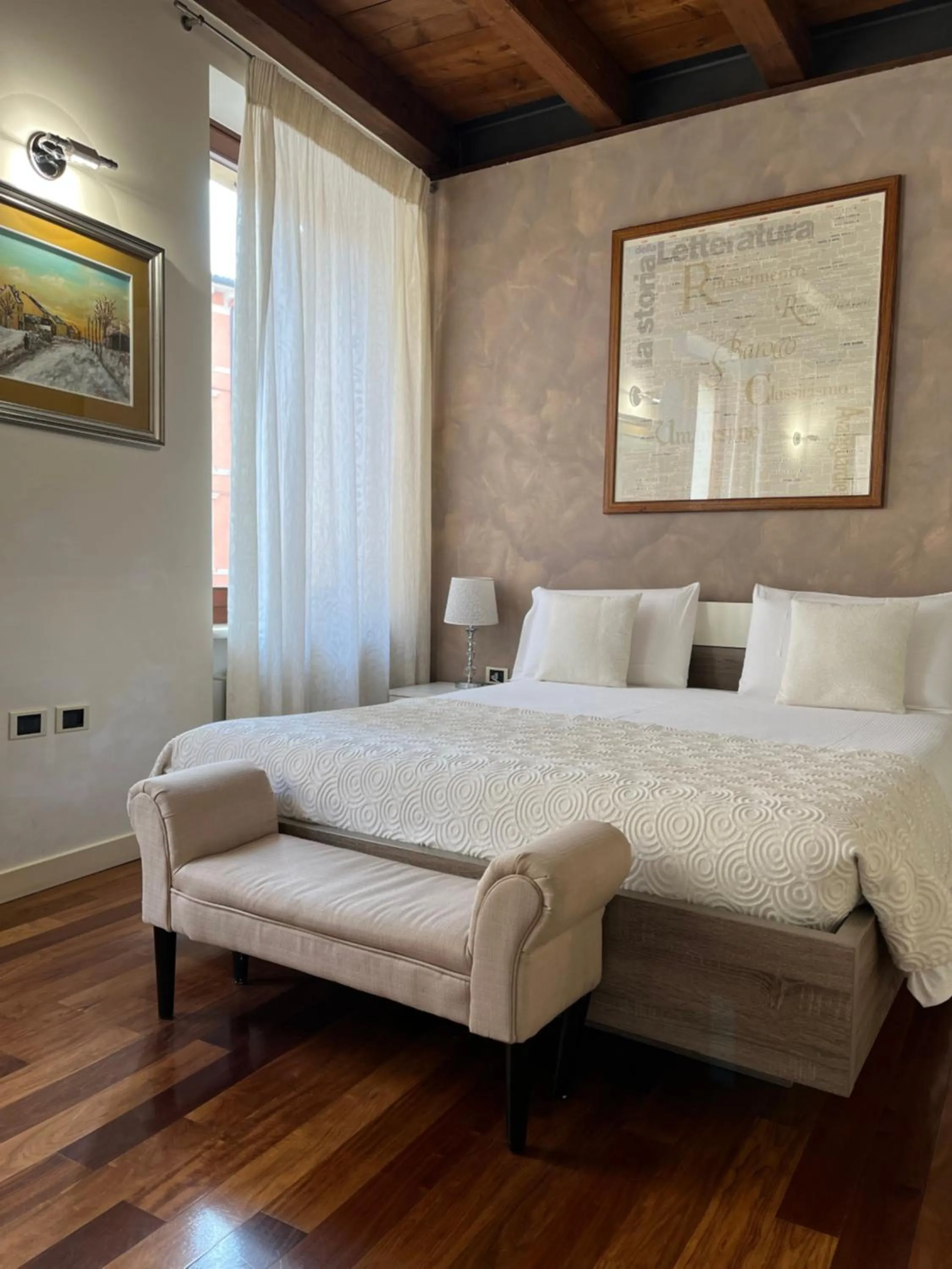 Bed in Relais Ponte Pietra