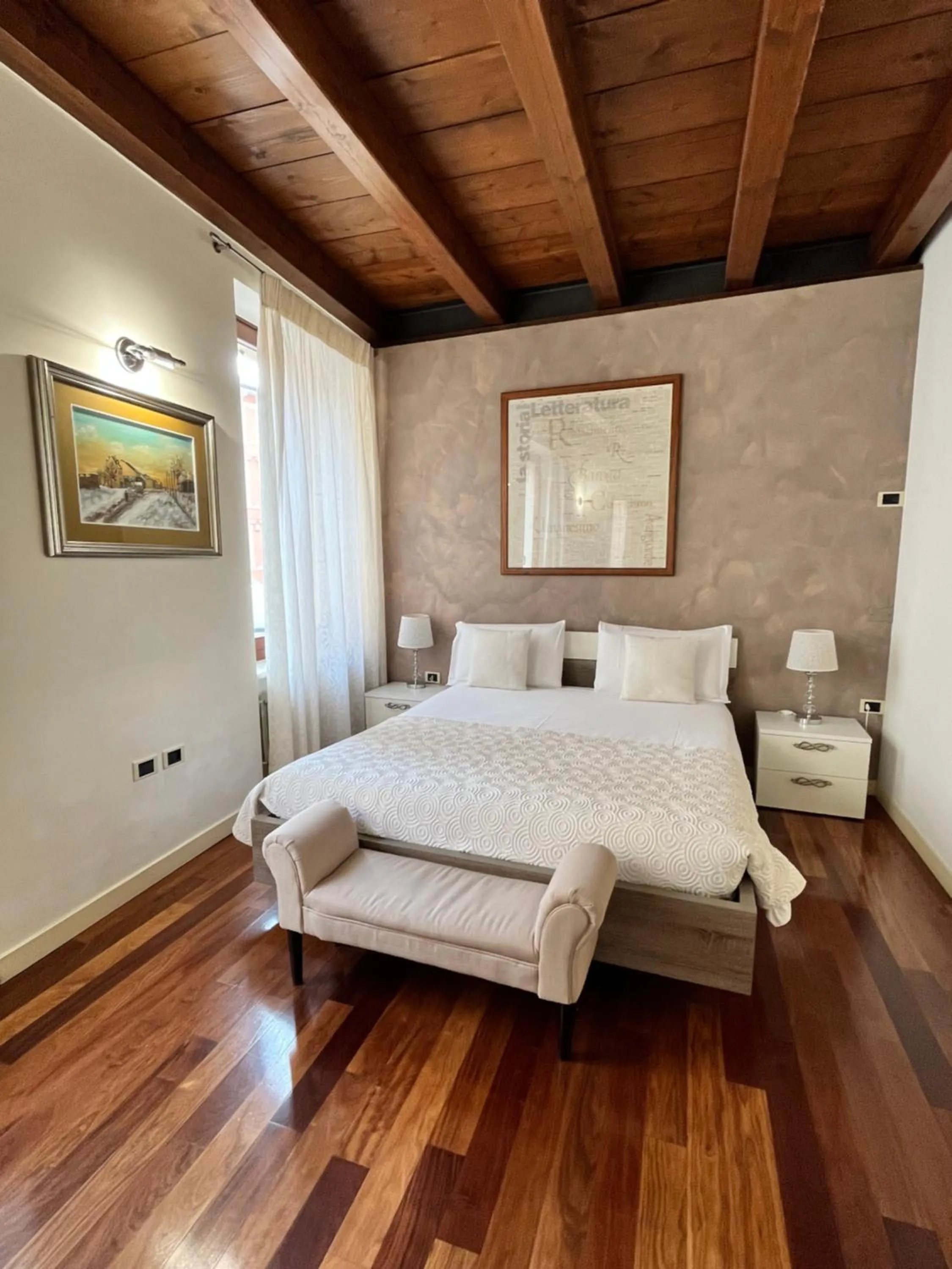 Bed in Relais Ponte Pietra