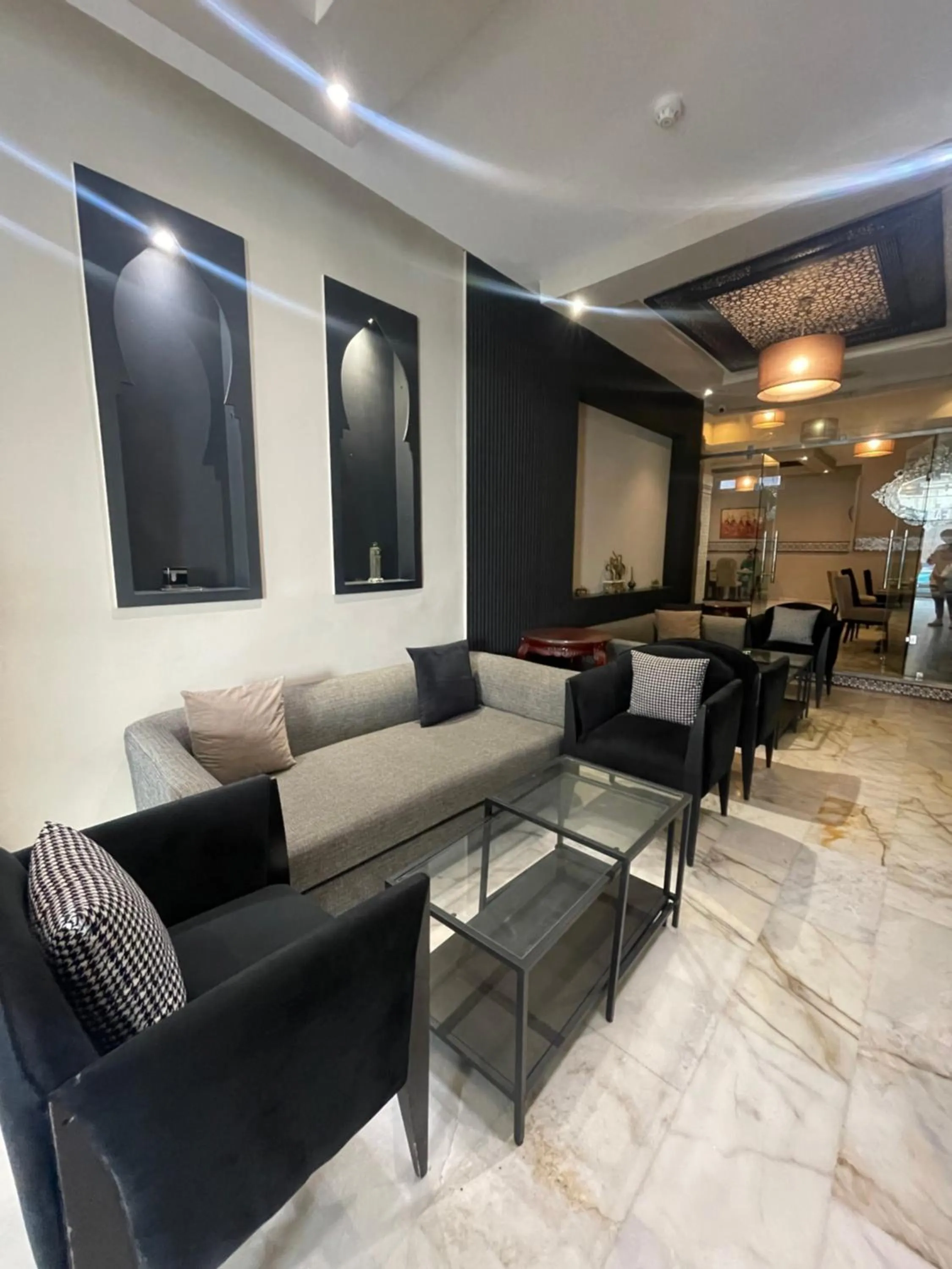 Lobby or reception in Cadé Hotel