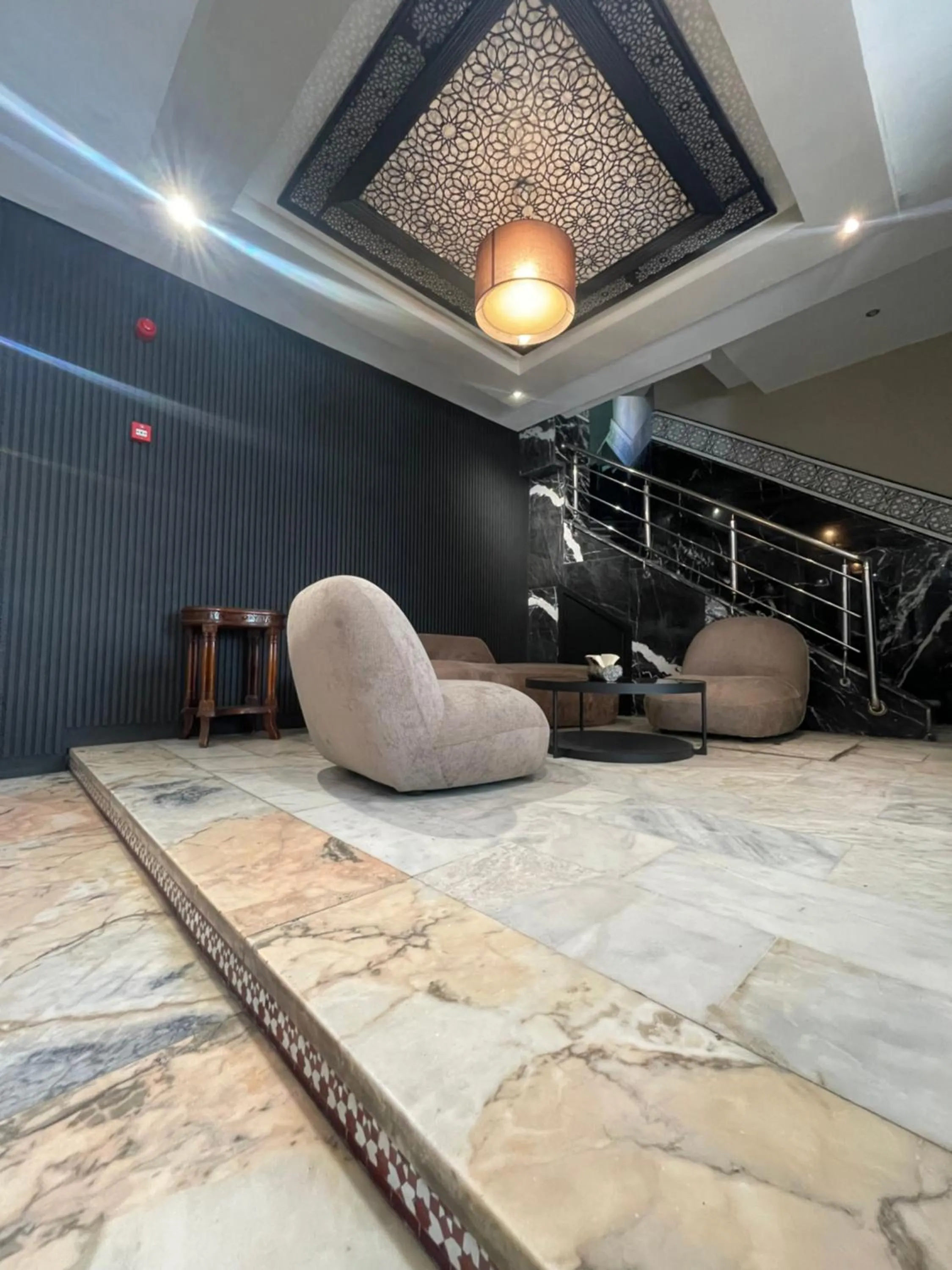 Lobby or reception in Cadé Hotel