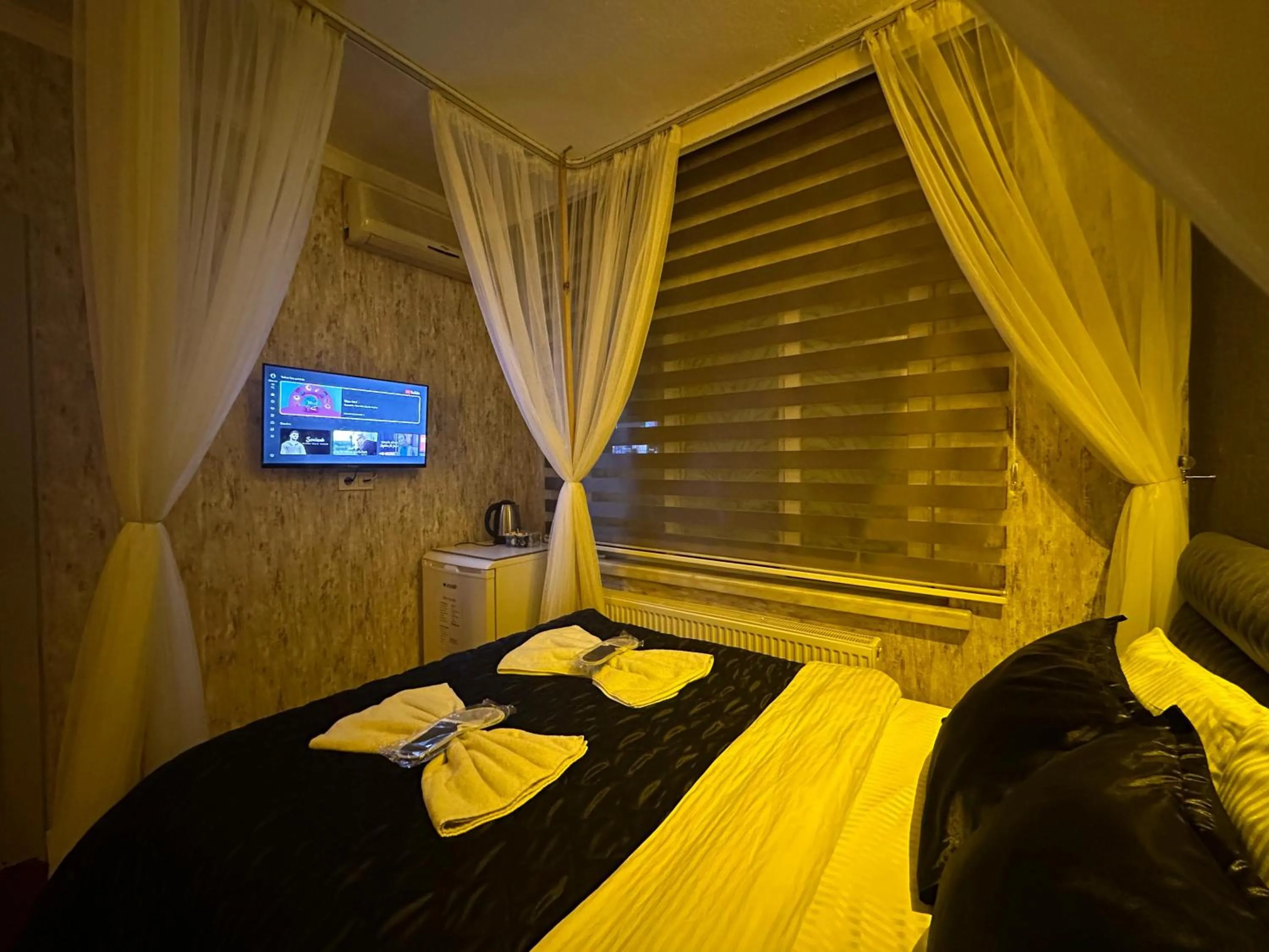 Bed in ENJOY HOUSE BOUTİQE OTEL