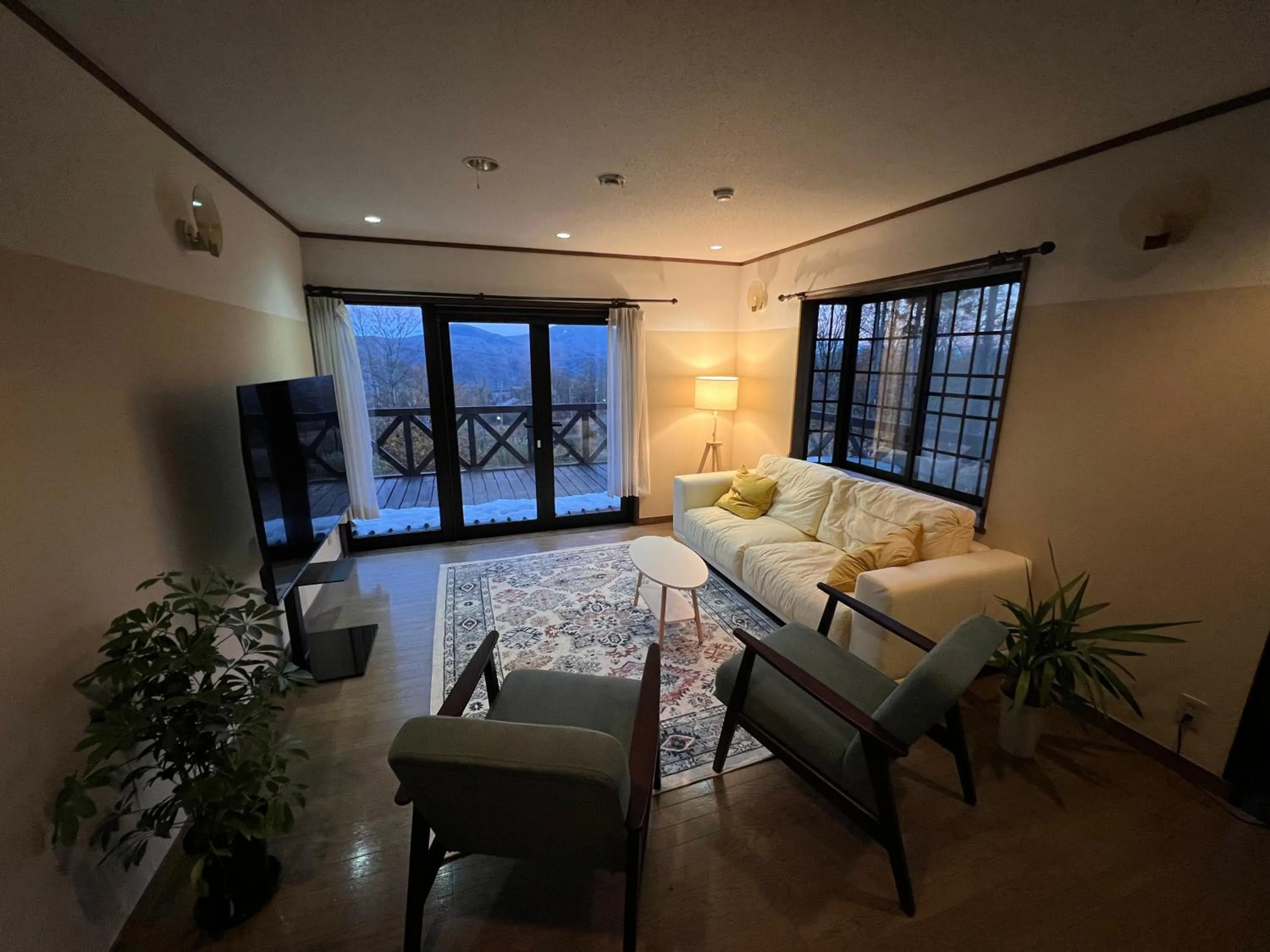 Communal lounge/ TV room, Bed in Daiju Myoko