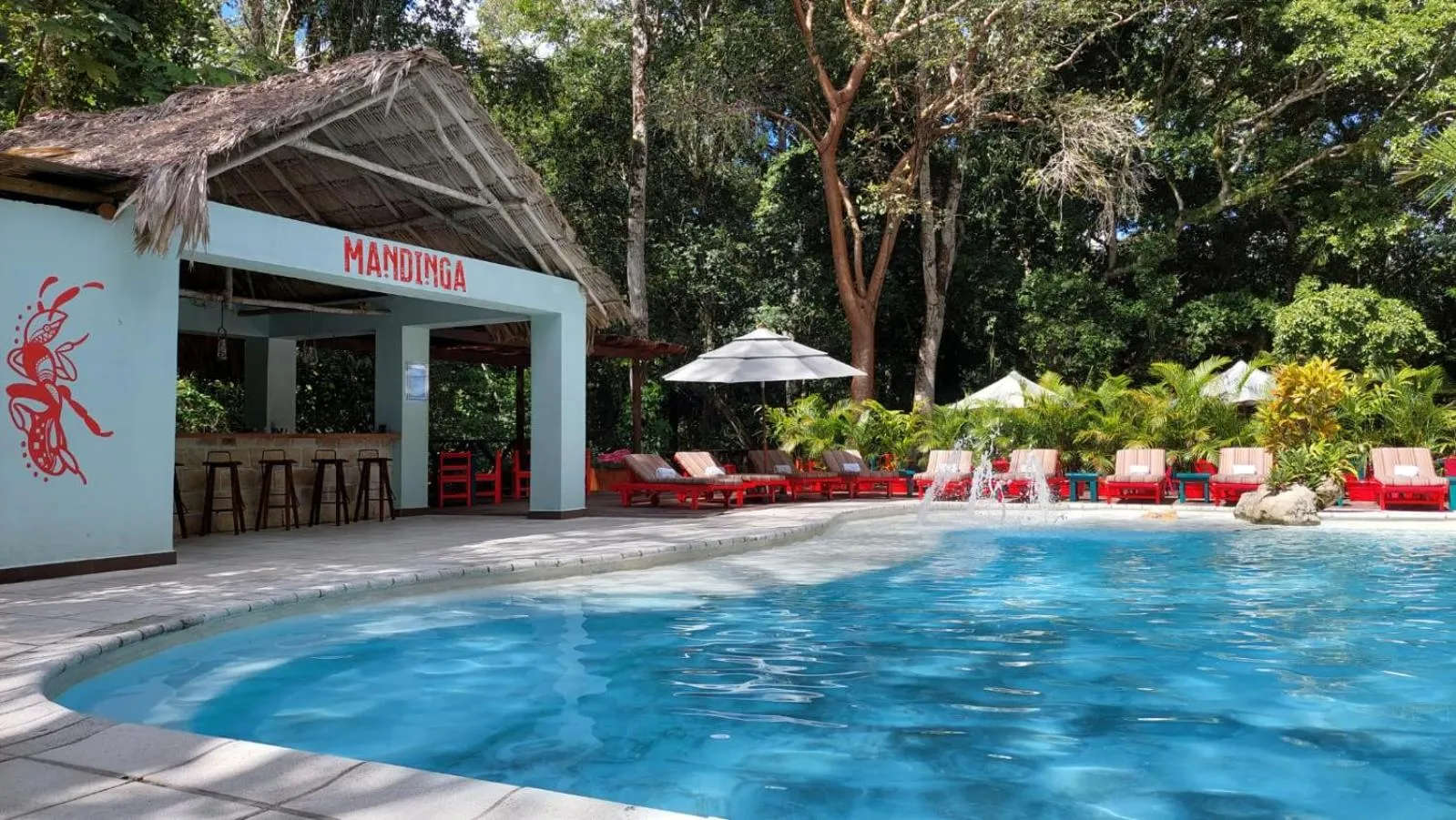 Swimming pool in Jungle Lodge Tikal Hostal