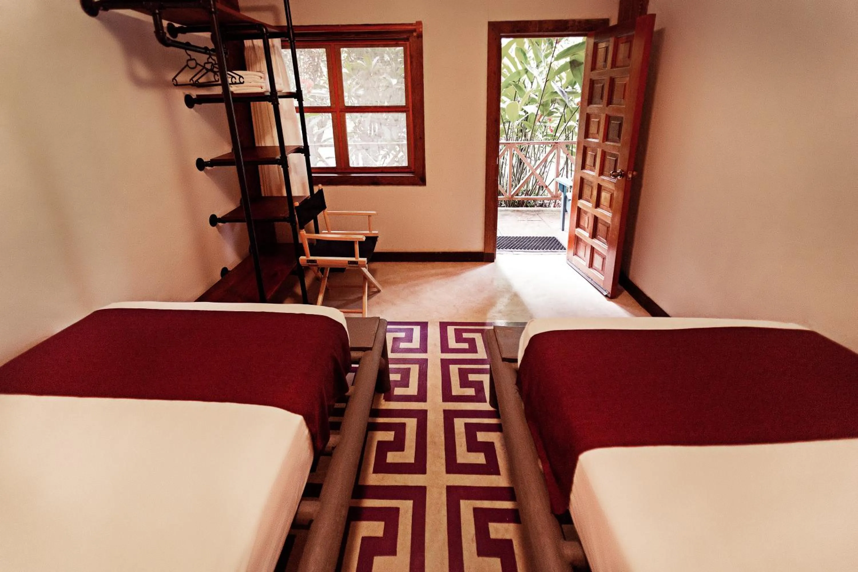 Decorative detail, Bed in Jungle Lodge Tikal Hostal