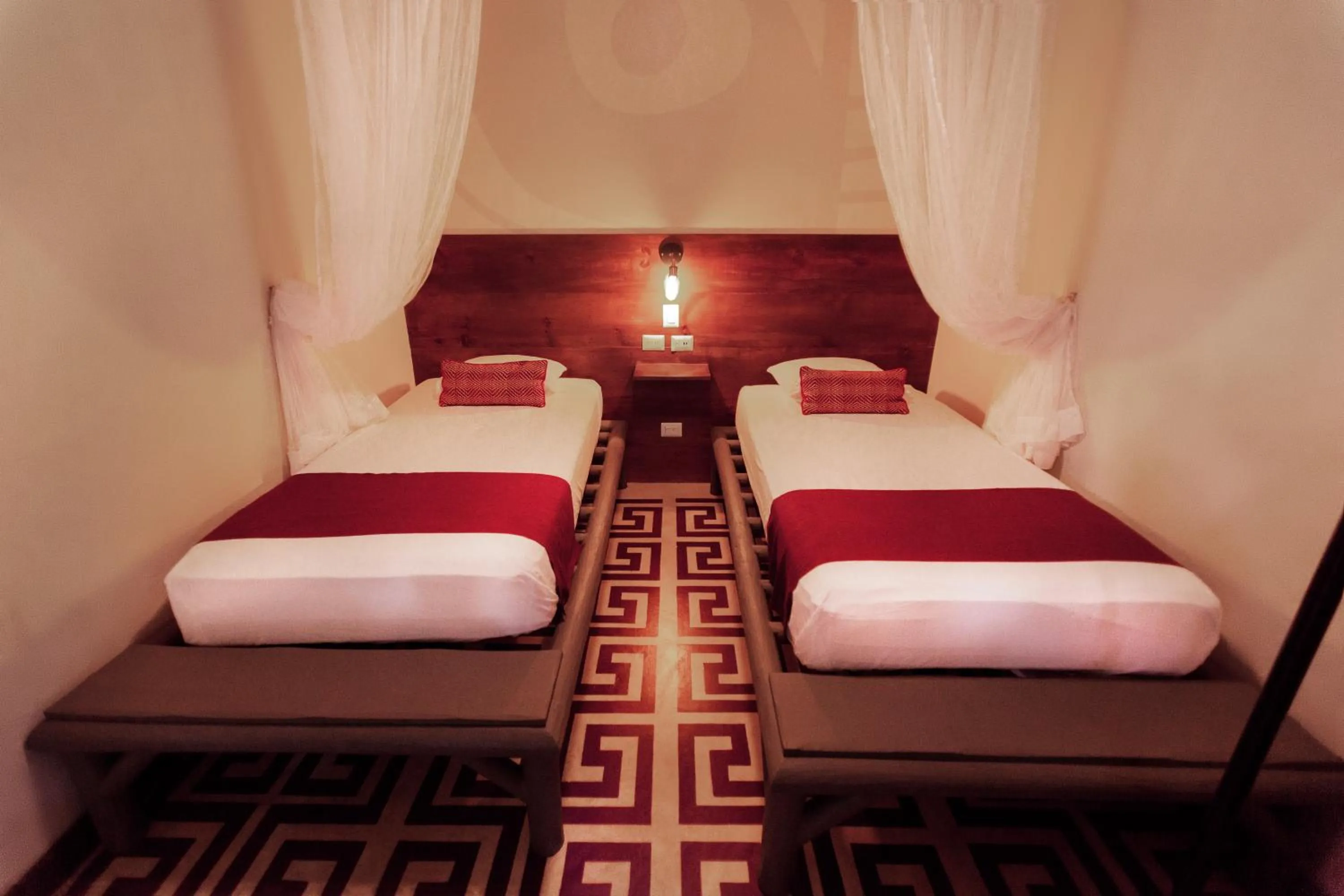 Photo of the whole room, Bed in Jungle Lodge Tikal Hostal