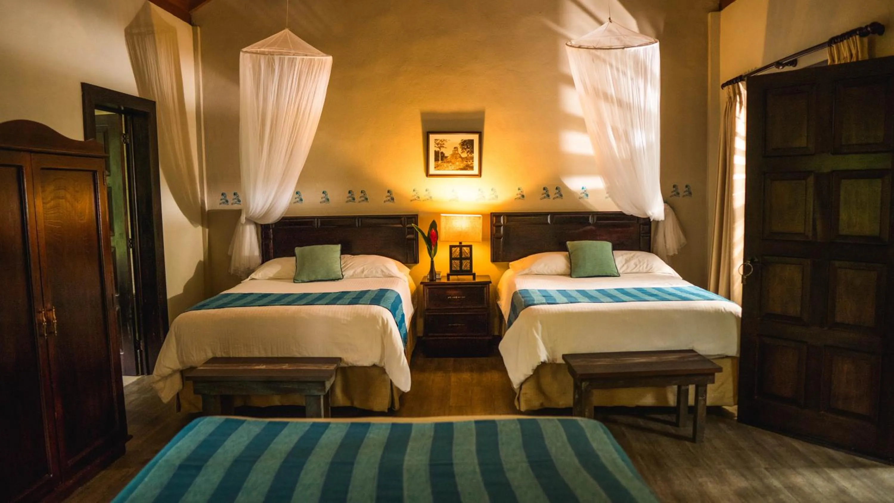 Bed in Hotel Jungle Lodge Tikal