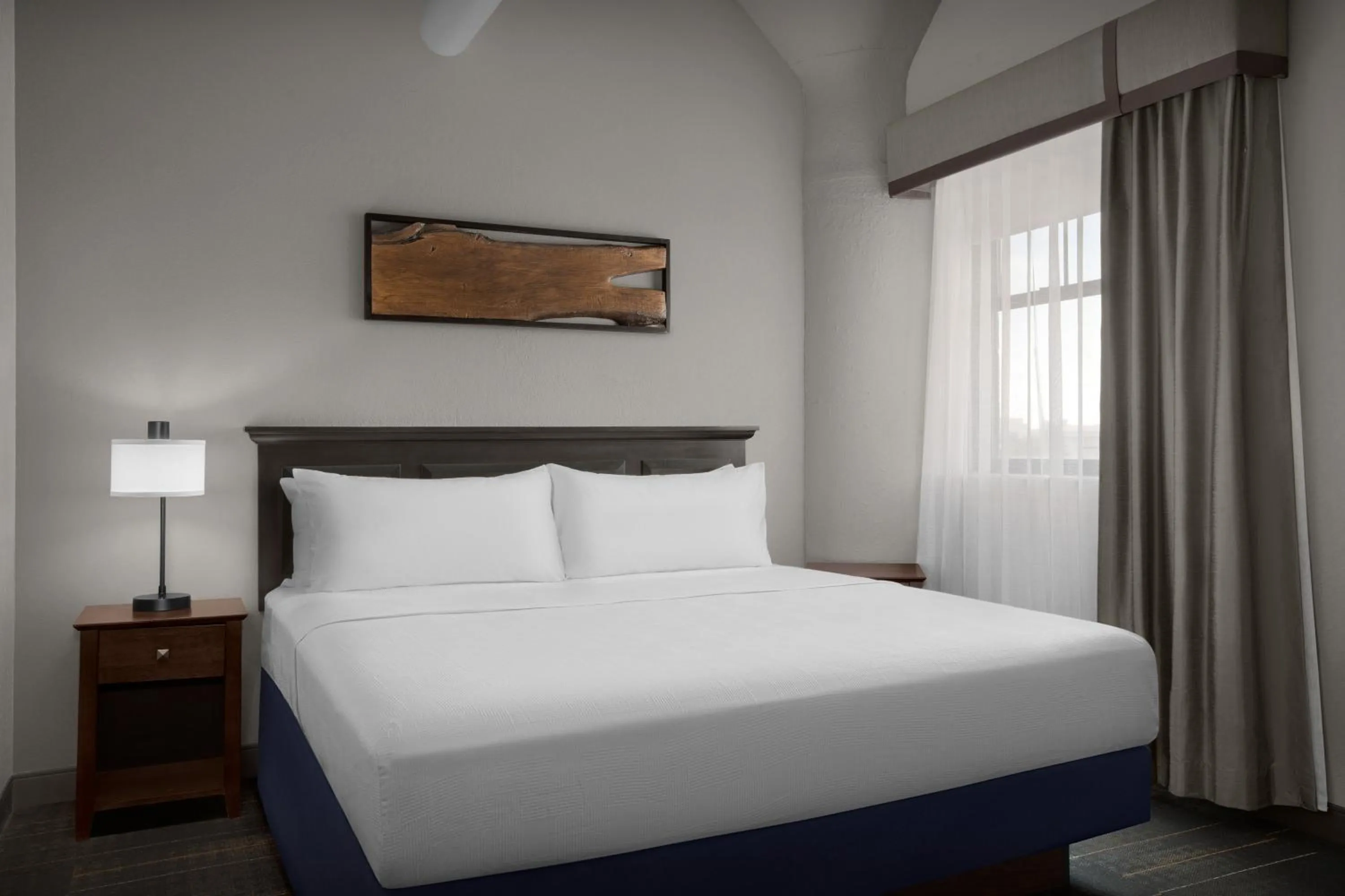 Bed in The Suites Hotel at Waterfront Plaza