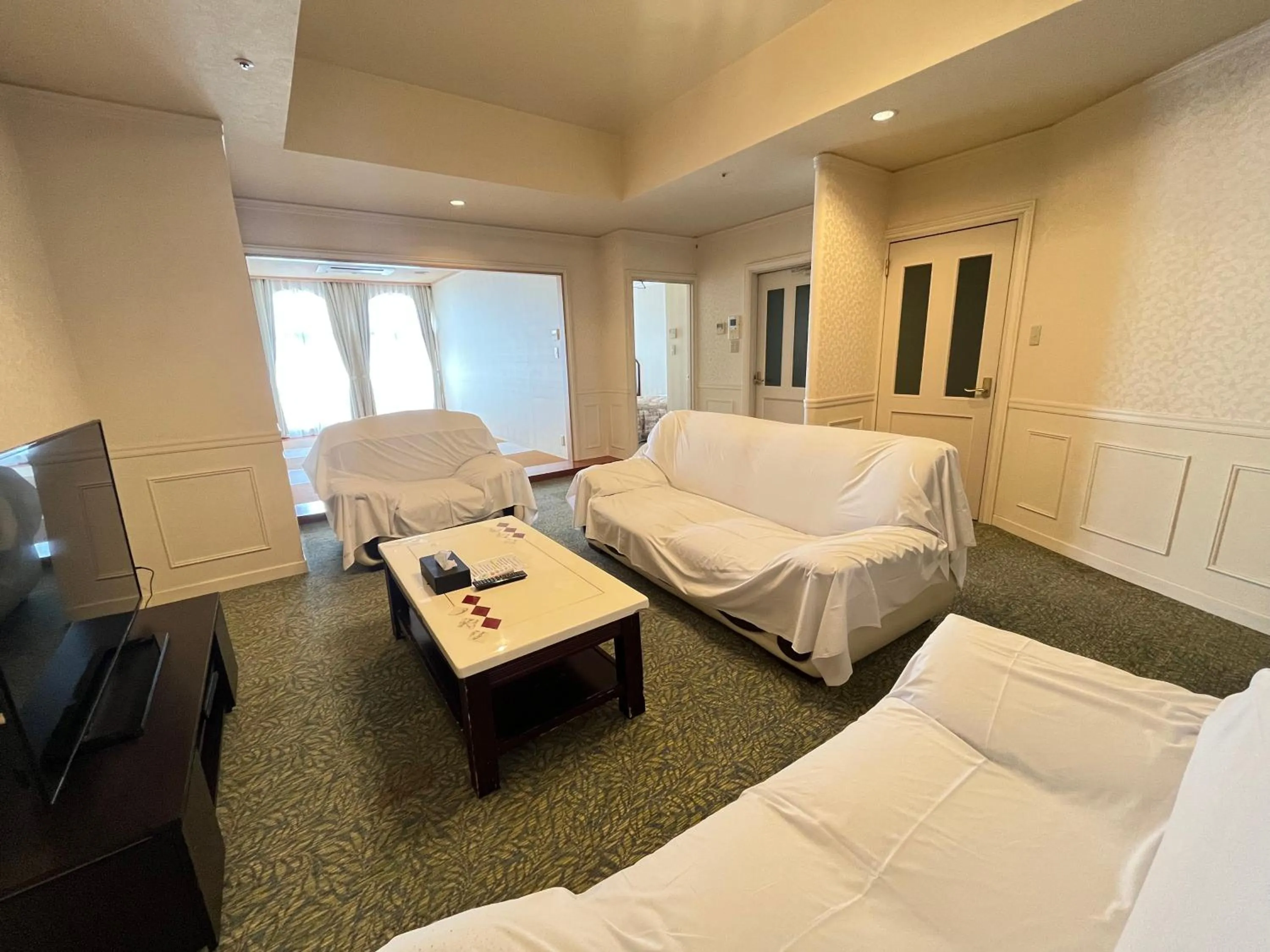 Living room, Bed in Spa Resort LiVEMAX