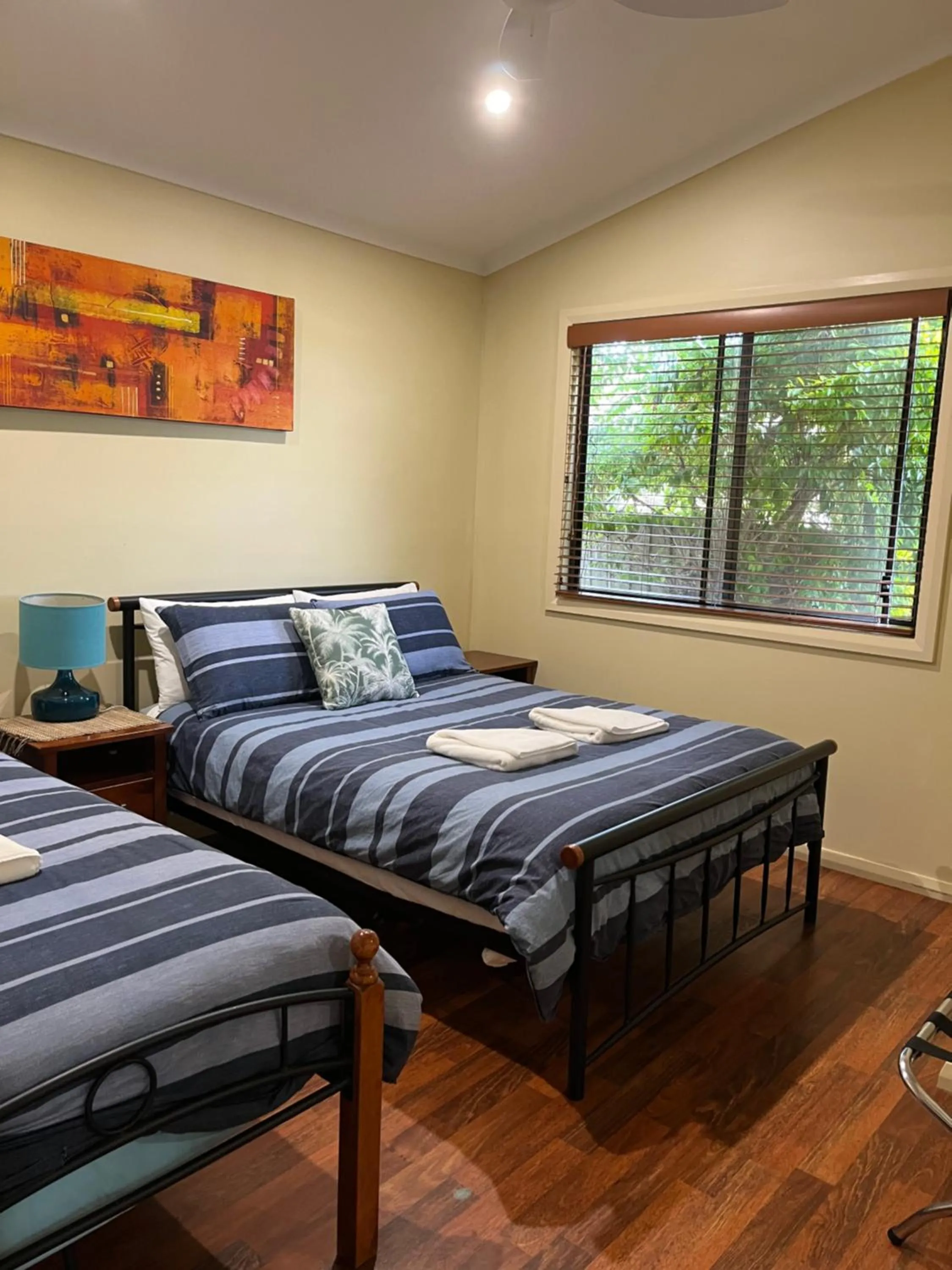 Bed in Safety Beach Bungalows