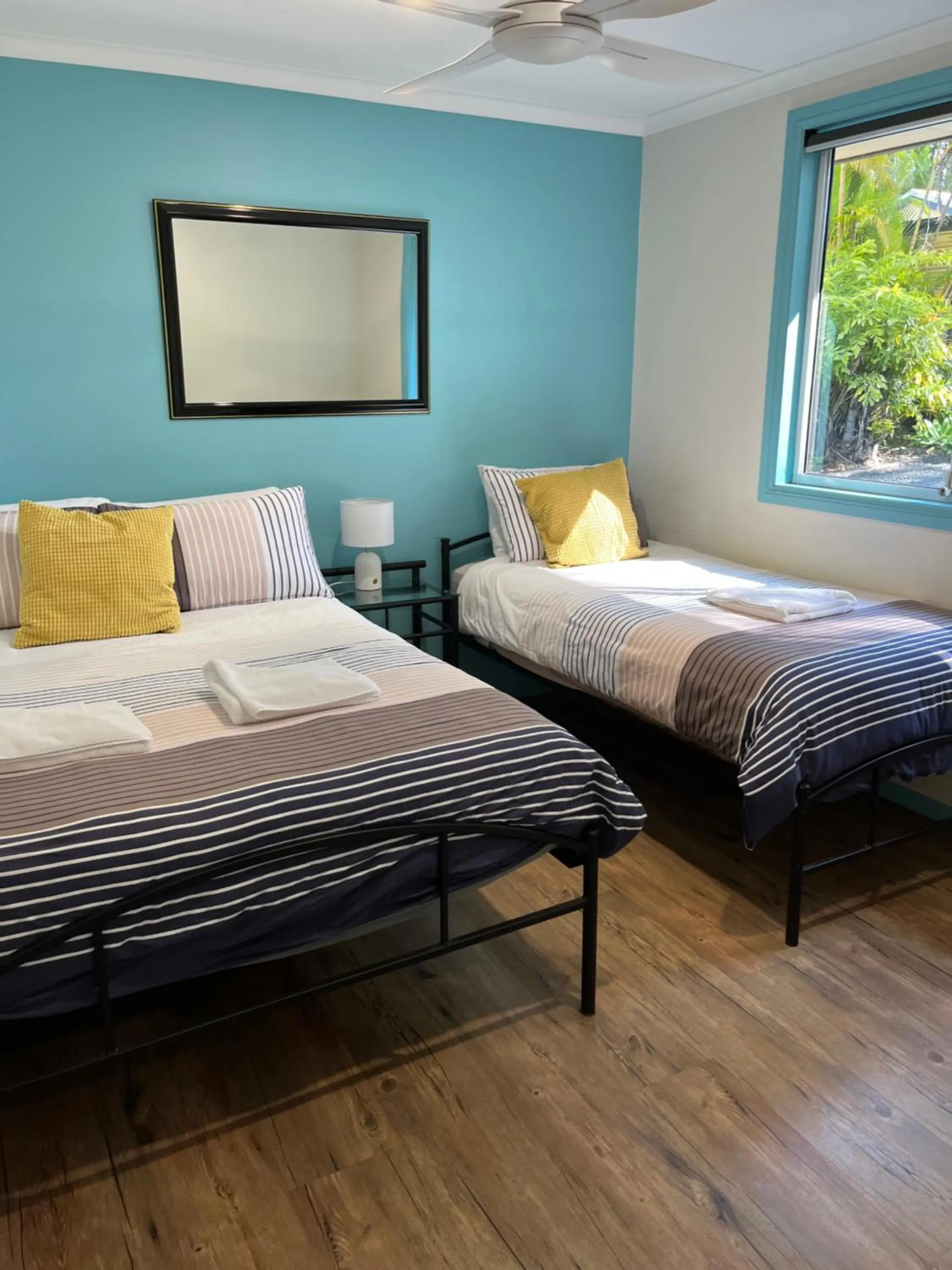 Bed in Safety Beach Bungalows