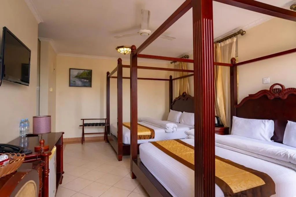 Bed in Island Paradise Inn