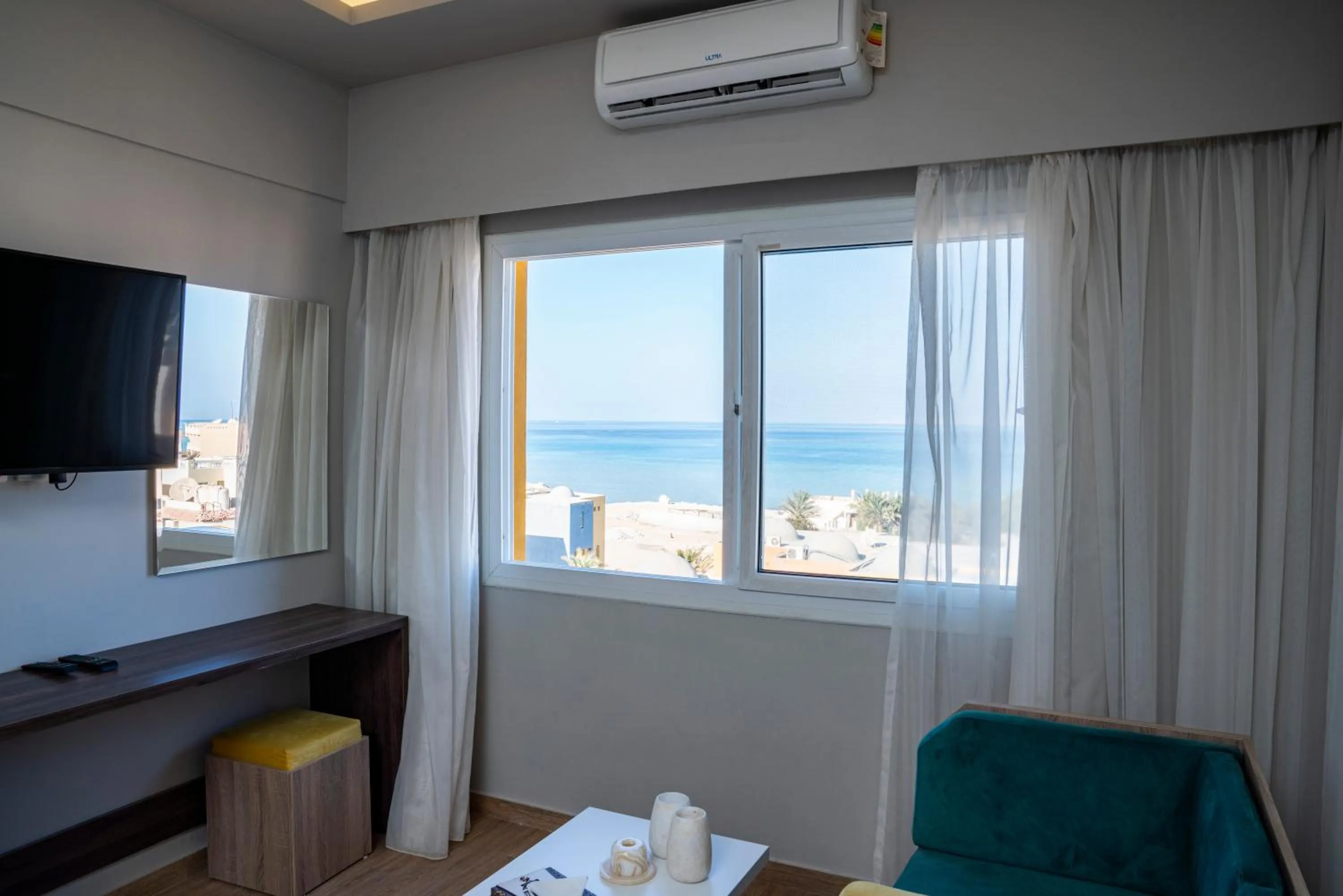 Communal lounge/ TV room in Al-Dora Beach Resort