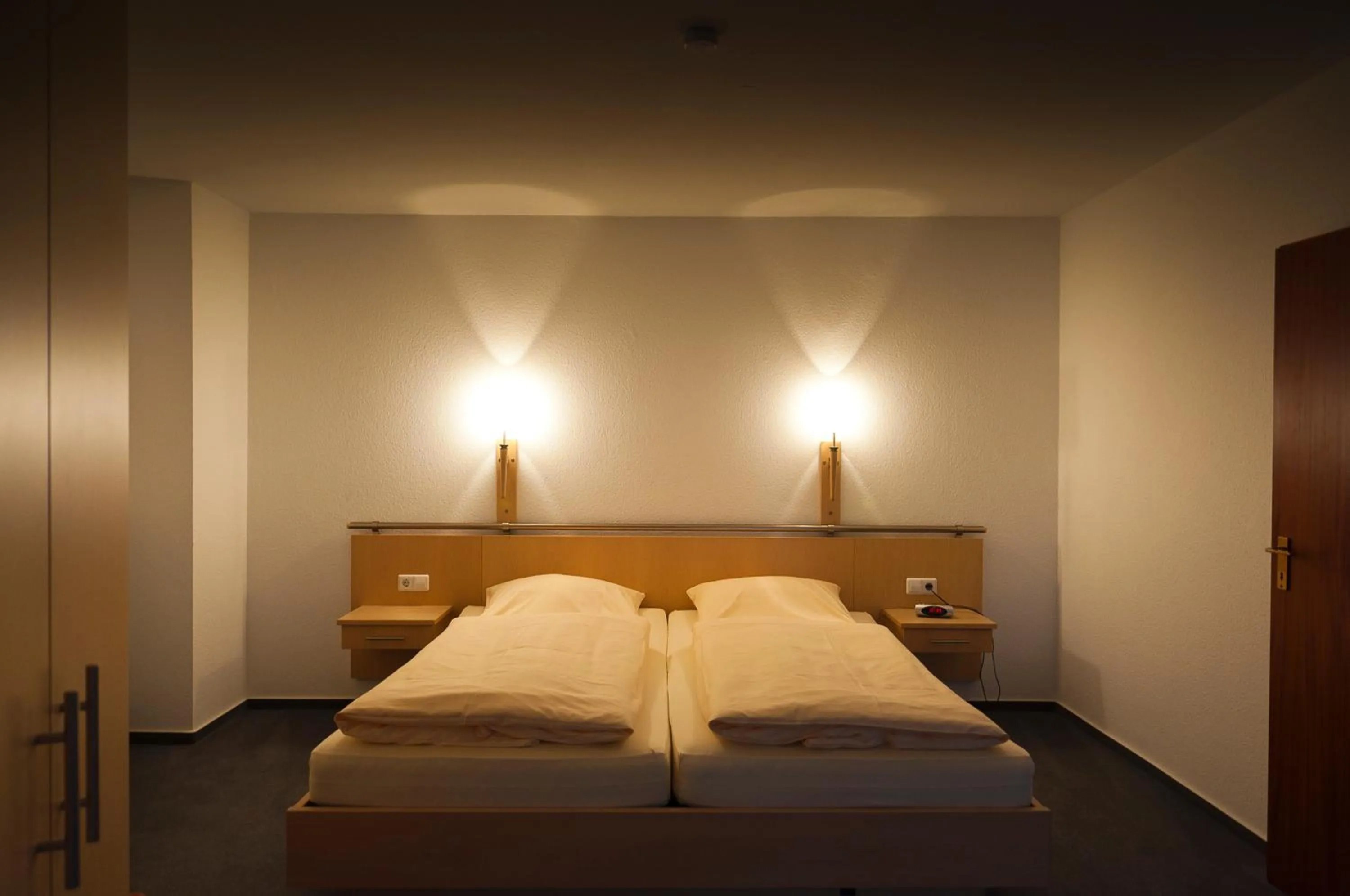 Bed in Hotel Haus Deutsch Krone