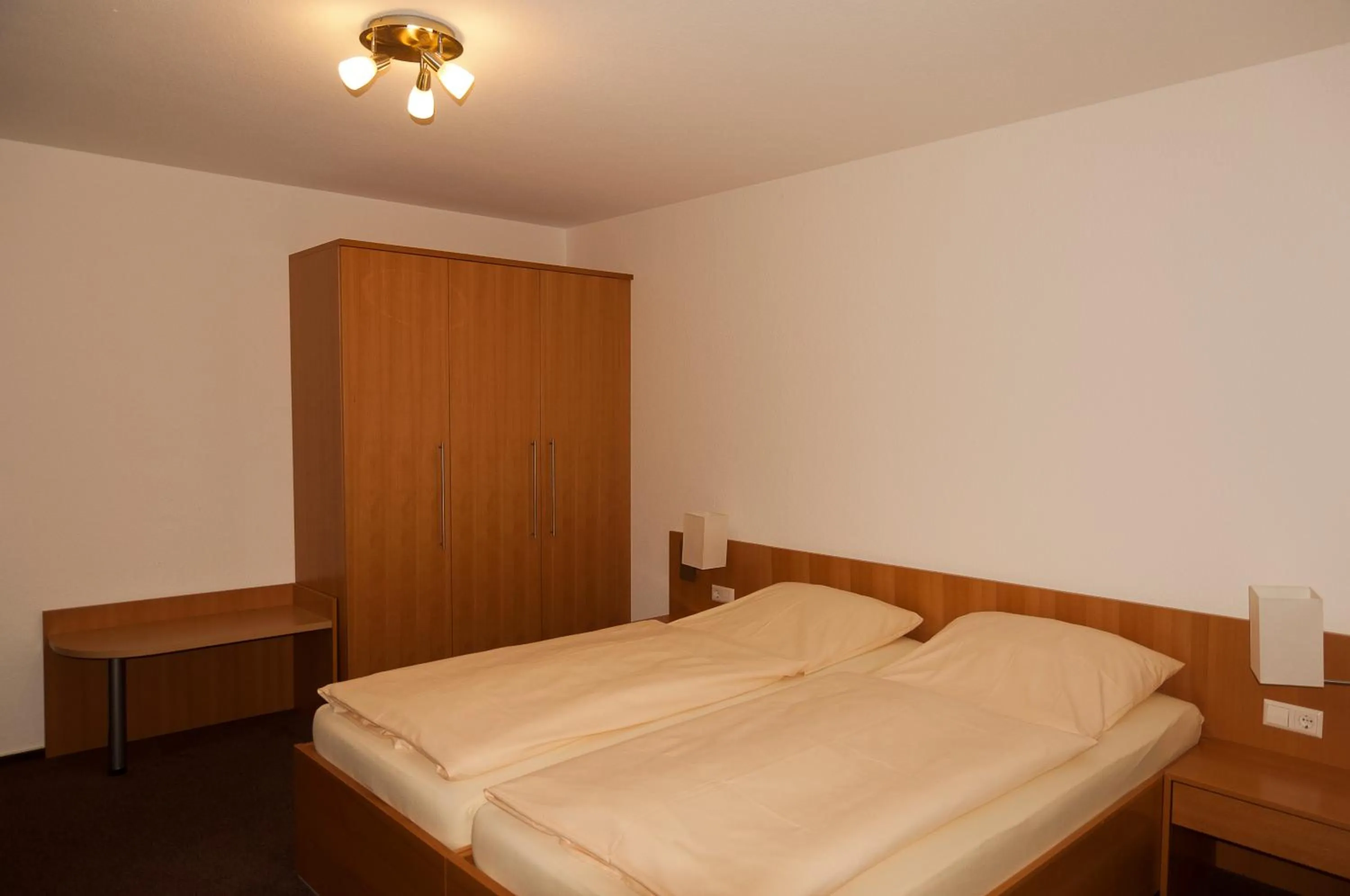 Bed in Hotel Haus Deutsch Krone