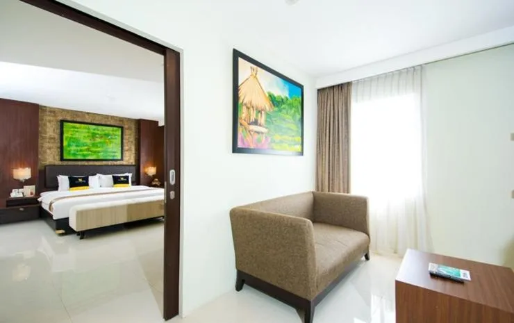 Bed in Noormans Hotel Semarang