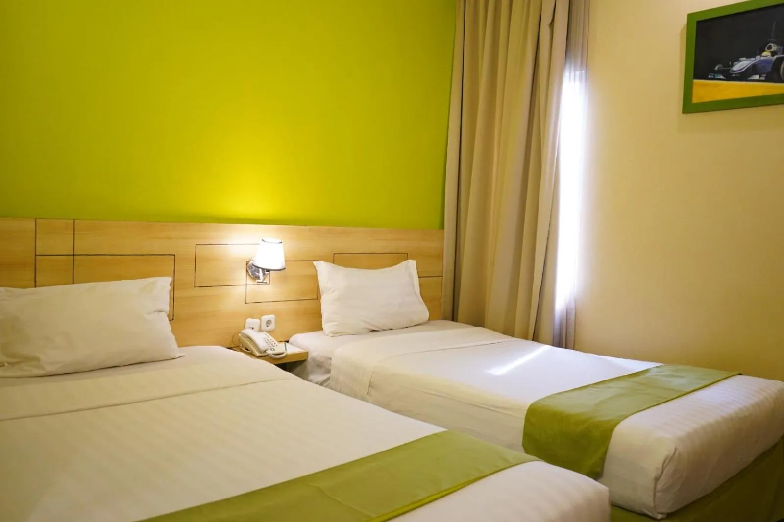 Bed in Lorin Syariah Hotel Sentul