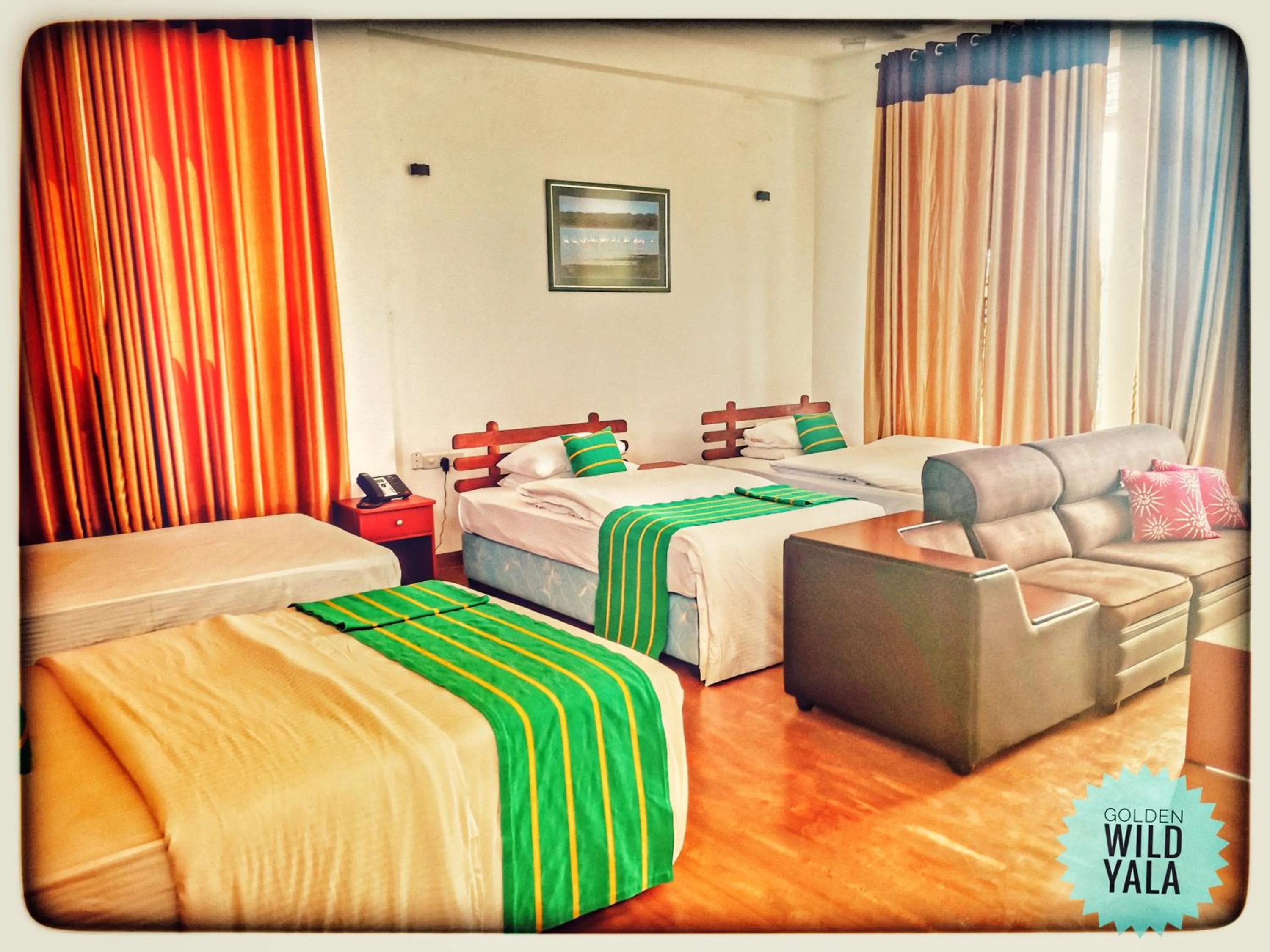 Seating area, Bed in Yala Golden Wild