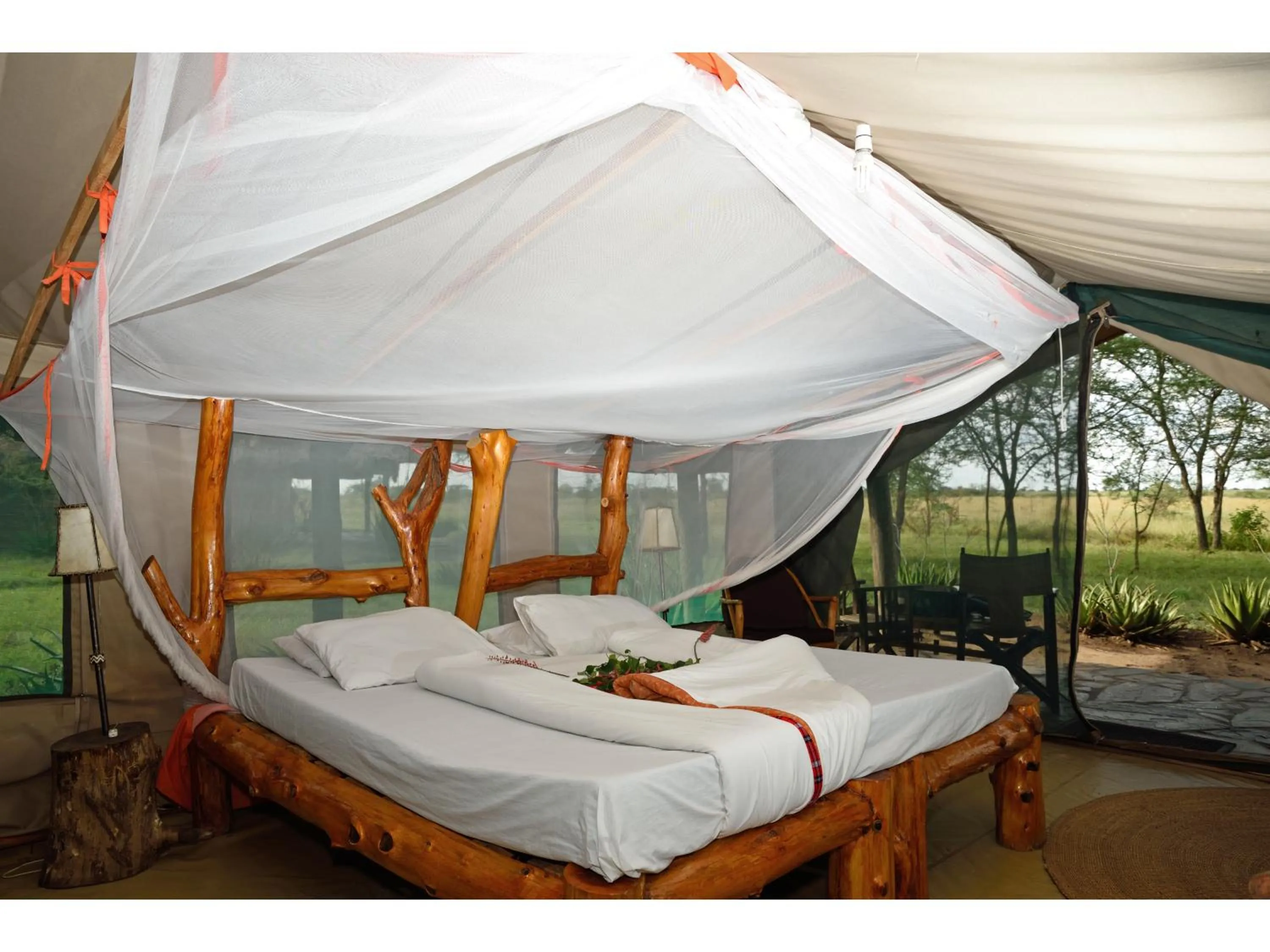 Bed in Ikoma Bush Camp